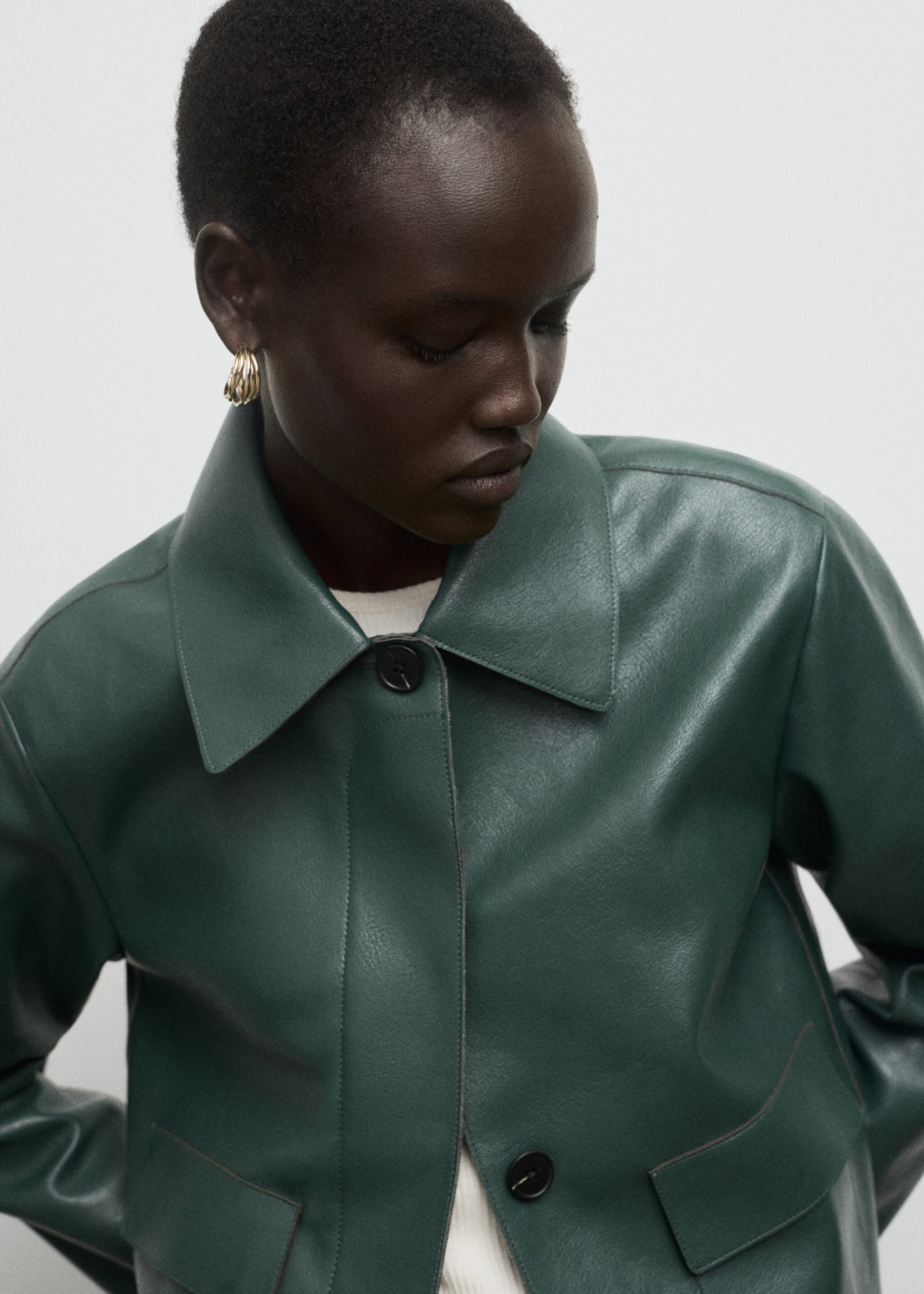 Leather-effect jacket with pockets - Details of the article 1, Green. Ref: 17094433-00.
