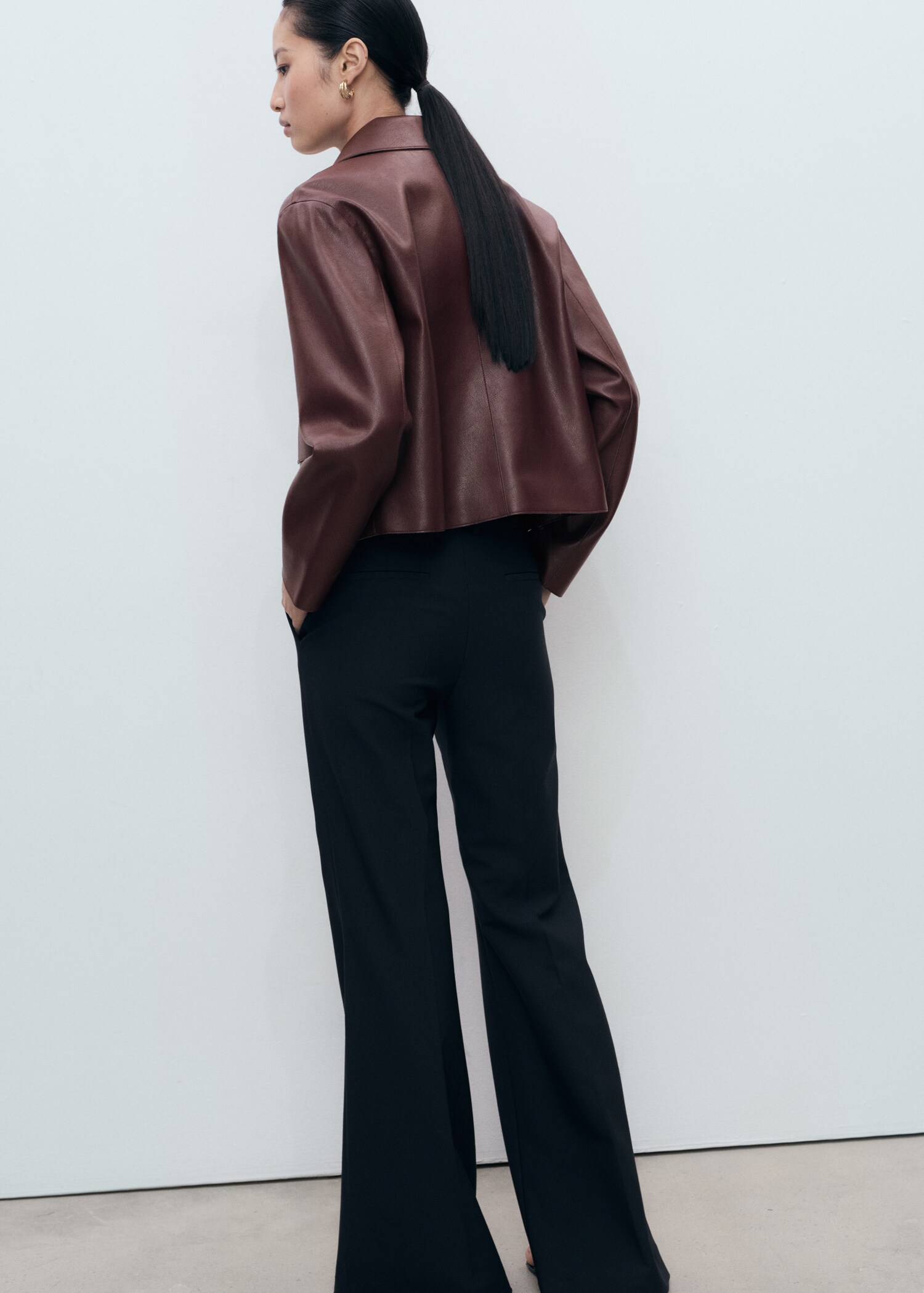 Leather-effect jacket with pockets - Reverse of the article