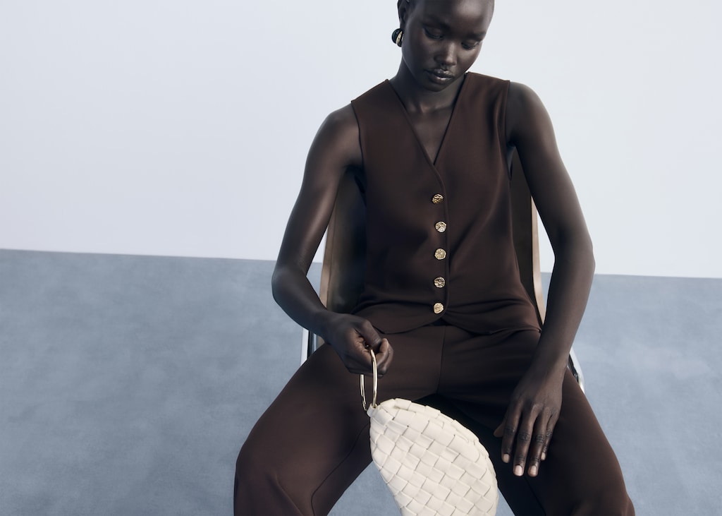 Vest with jewel buttons