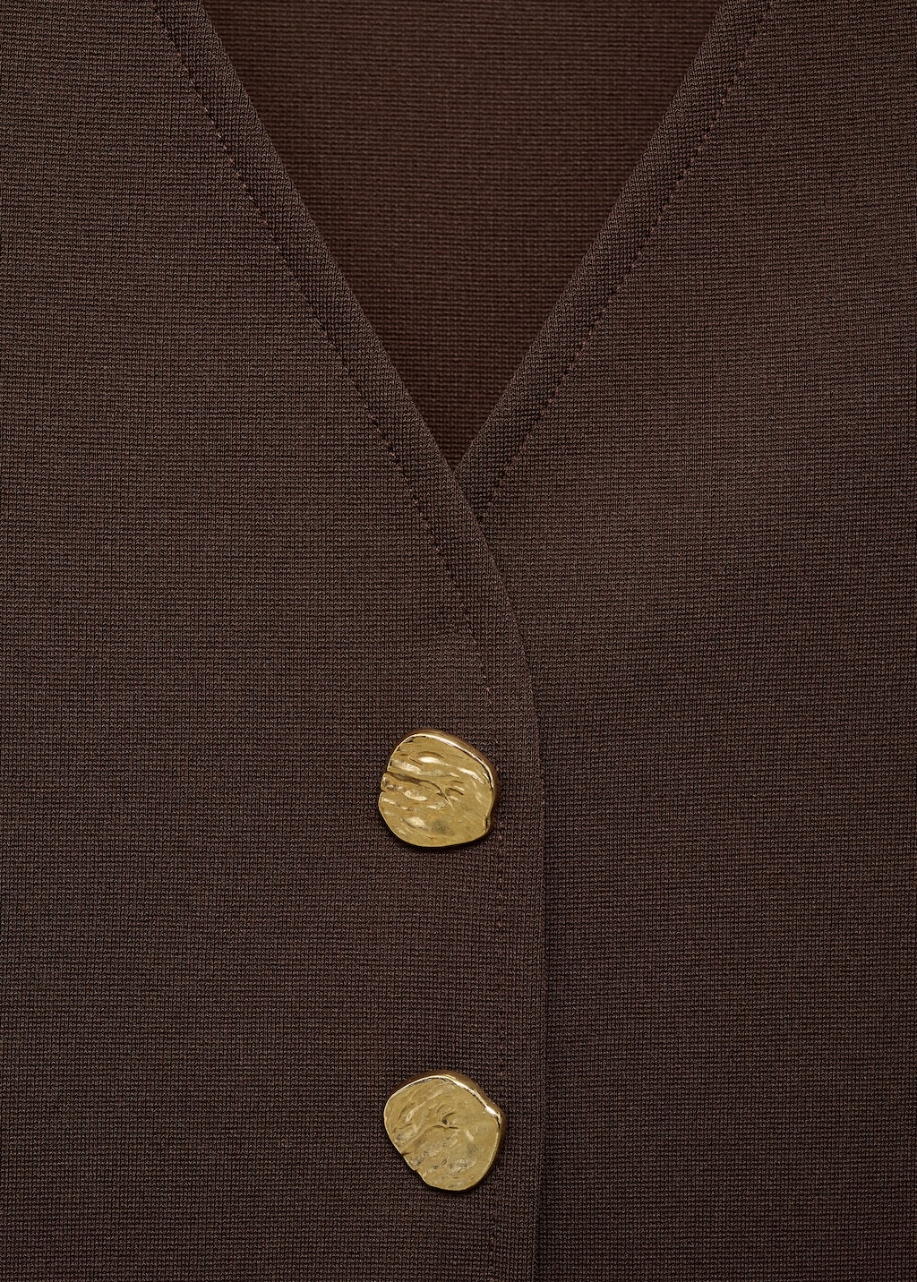 Vest with jewel buttons