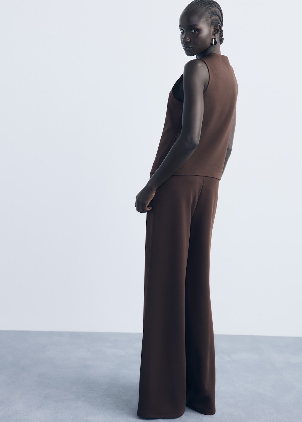 Vest with jewel buttons