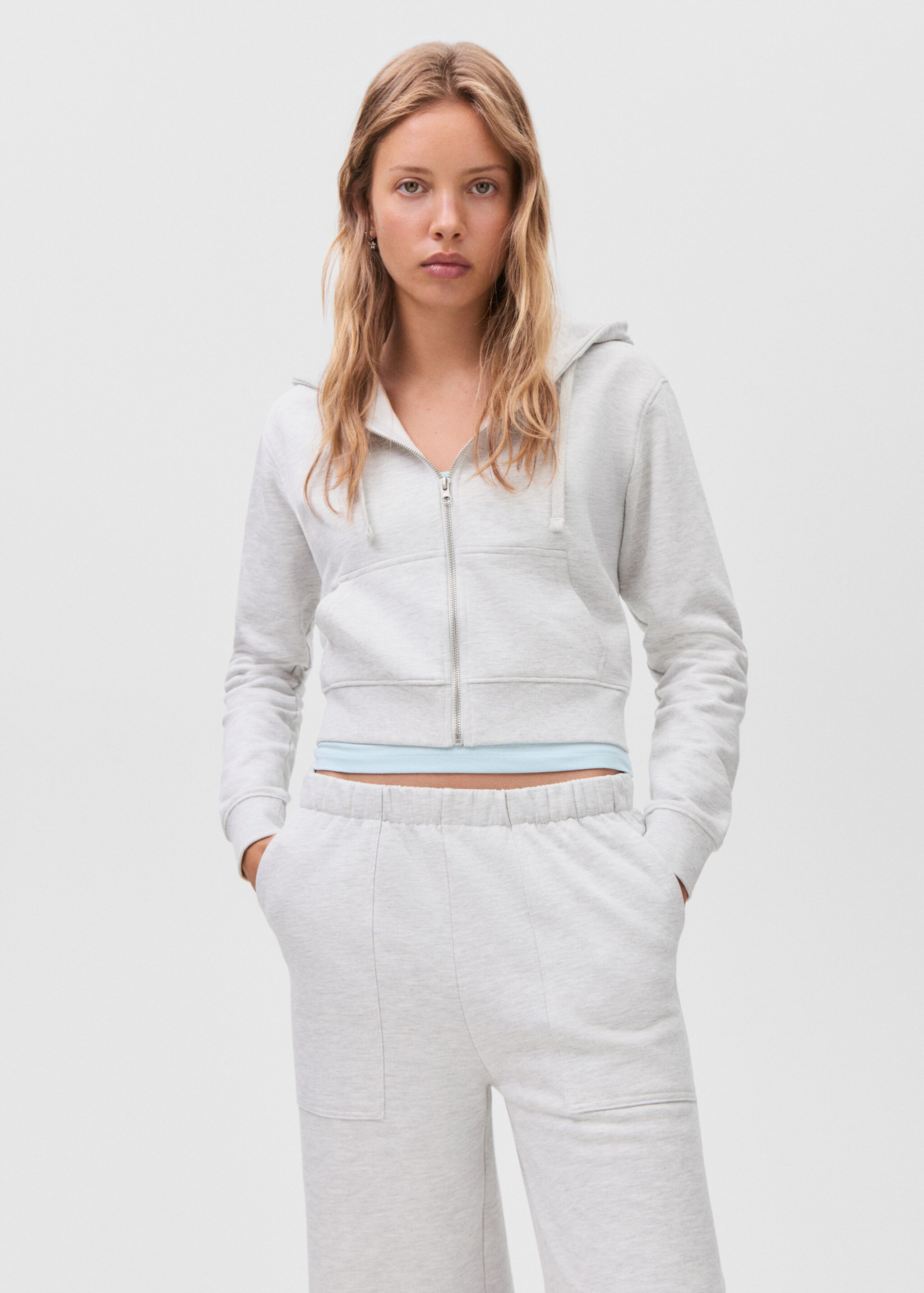Cotton joggers with seams - Details of the article 6, Light Heather Grey. Ref: 17094773-00.