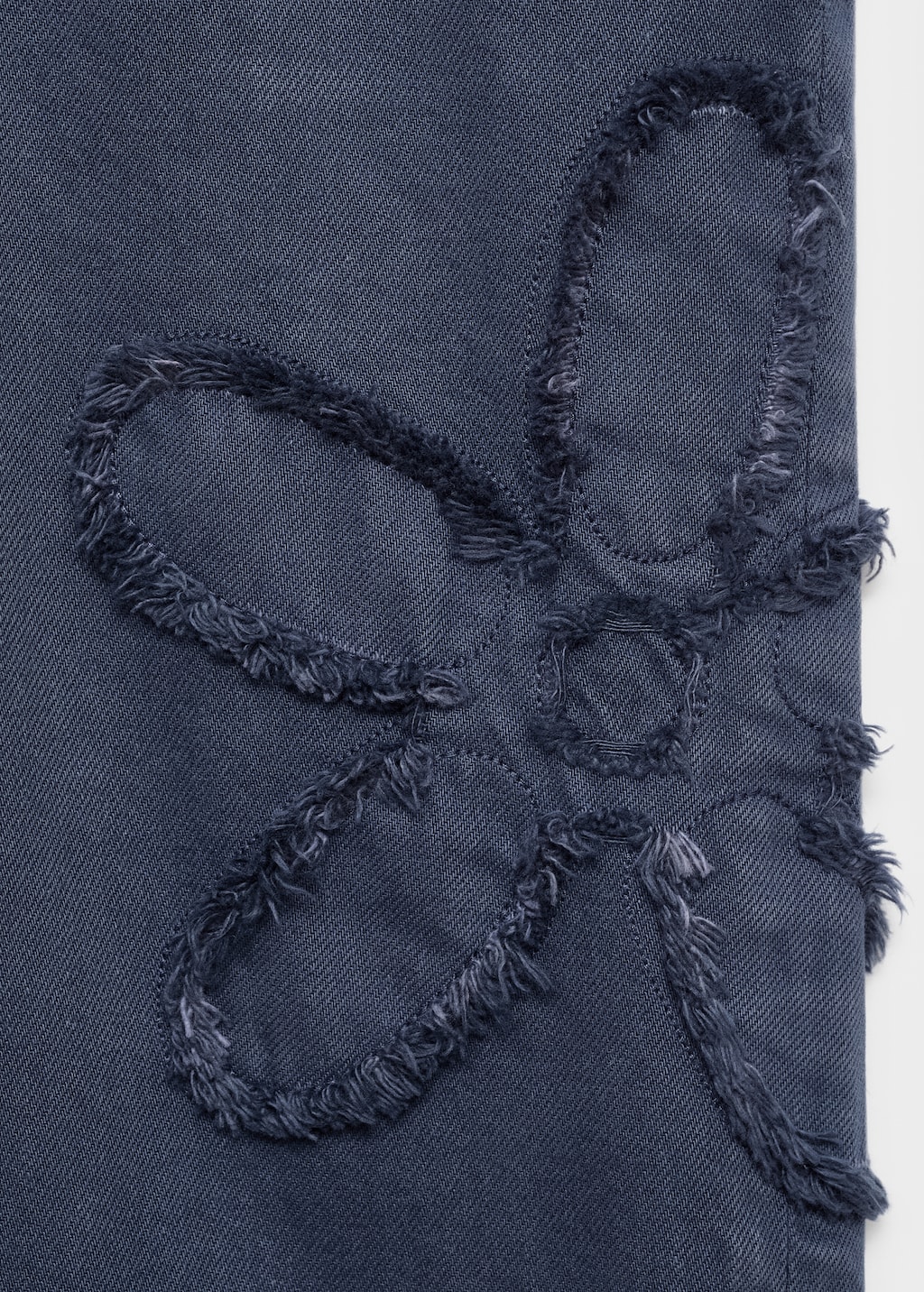 Wide-leg jeans with flower detail