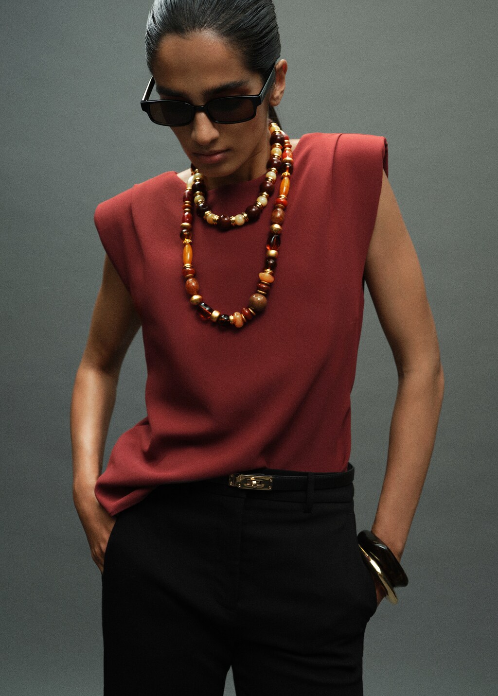Ruched blouse with shoulder pads