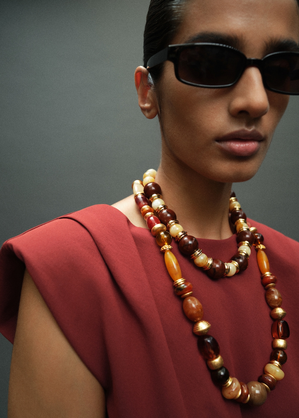 Ruched blouse with shoulder pads