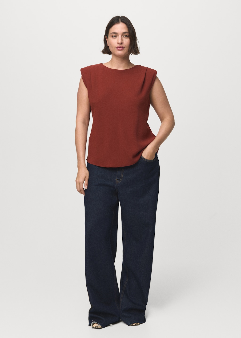 Ruched blouse with shoulder pads