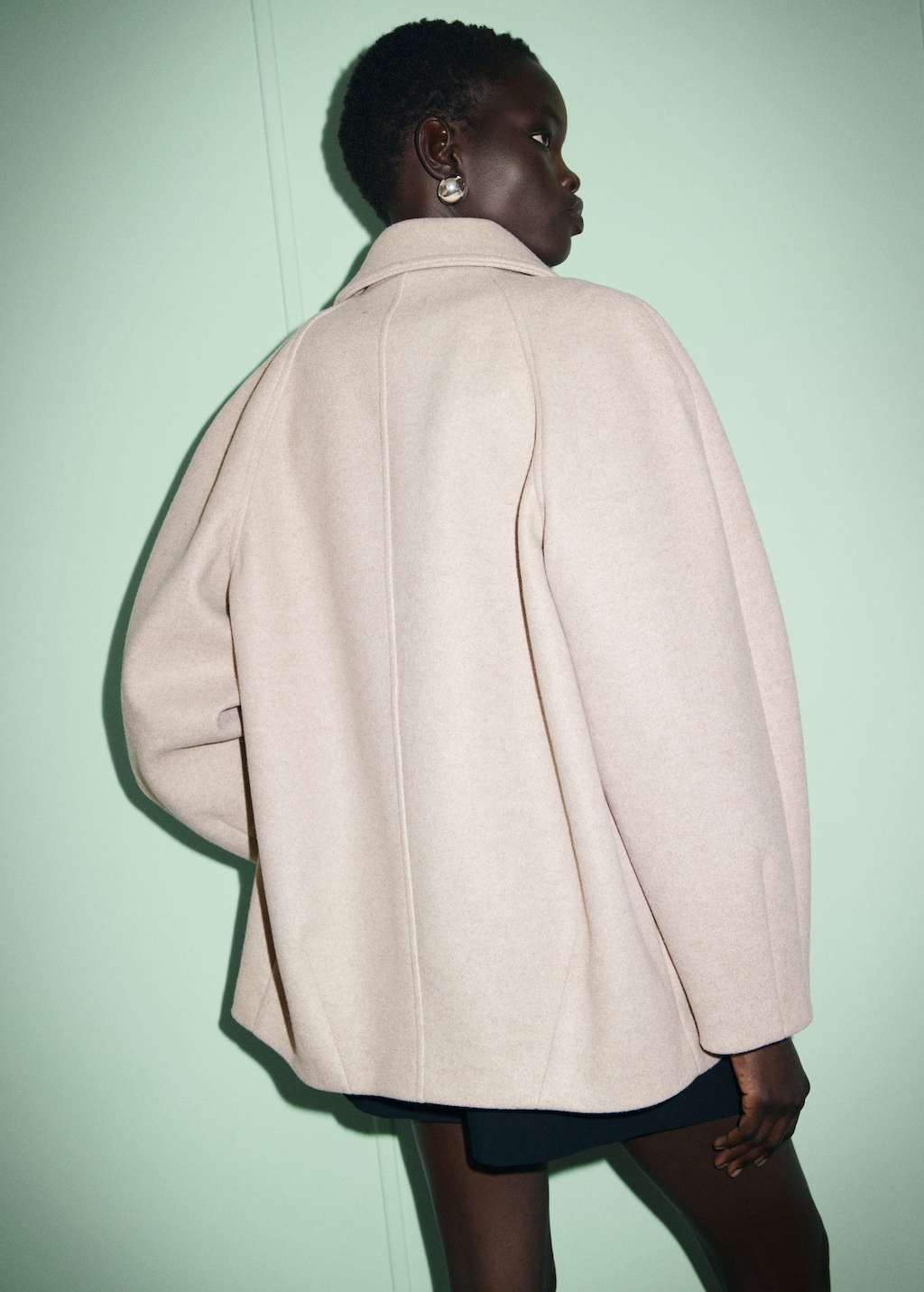 Short coat with notched lapel collar