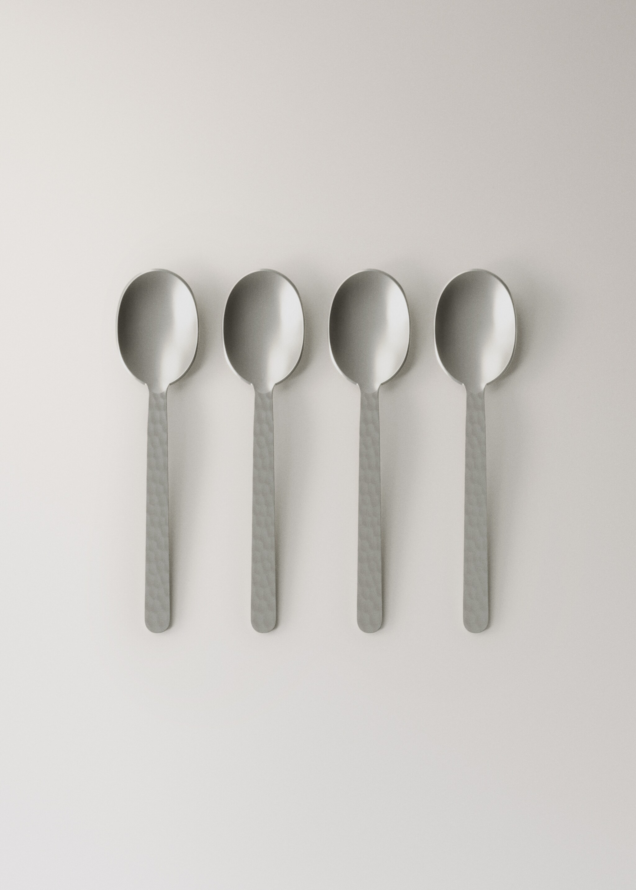 Set of 4 hammered stainless steel dessert spoons - Article without model, Silver. Ref: 17095821-00.