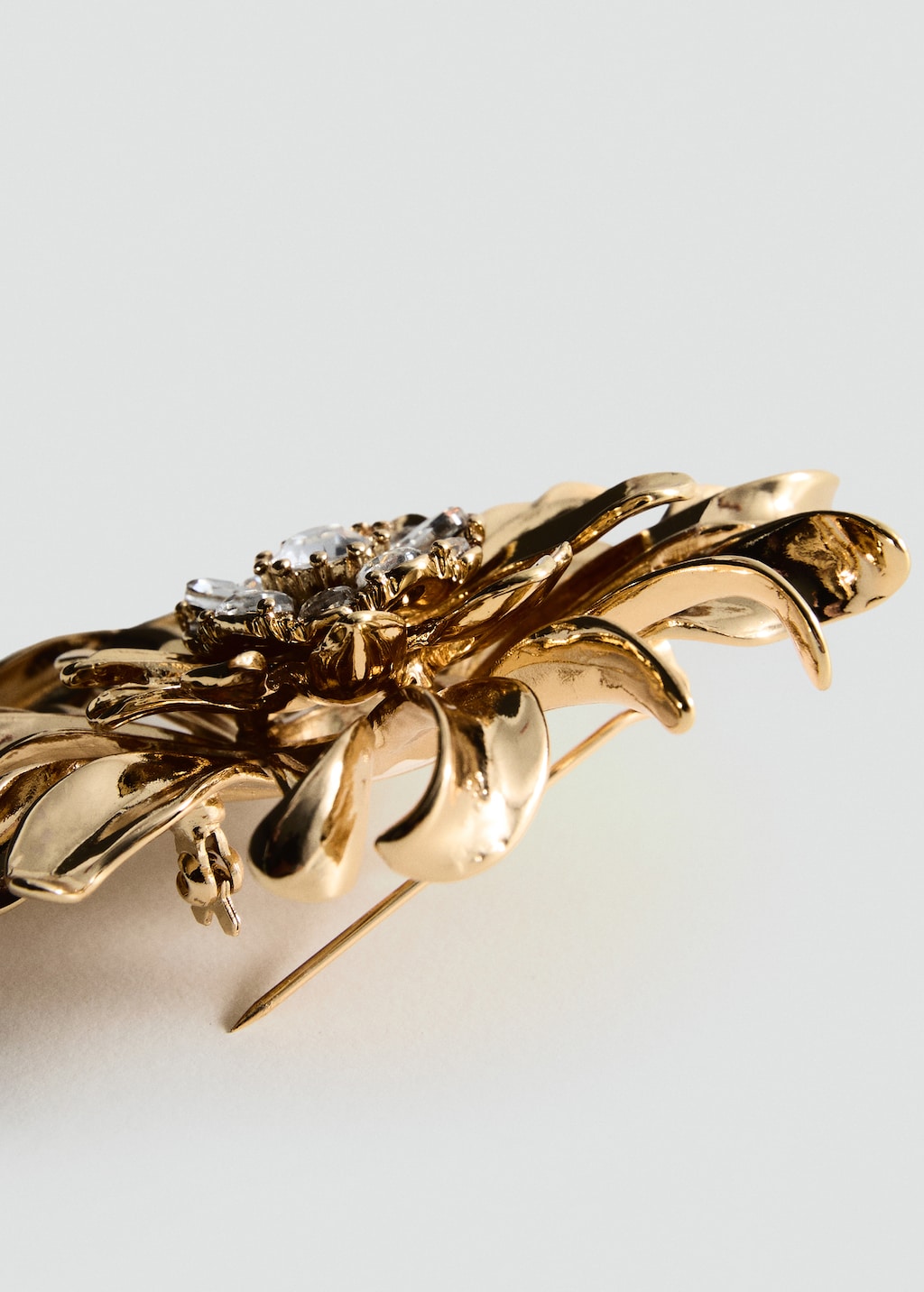 Metallic flower brooch