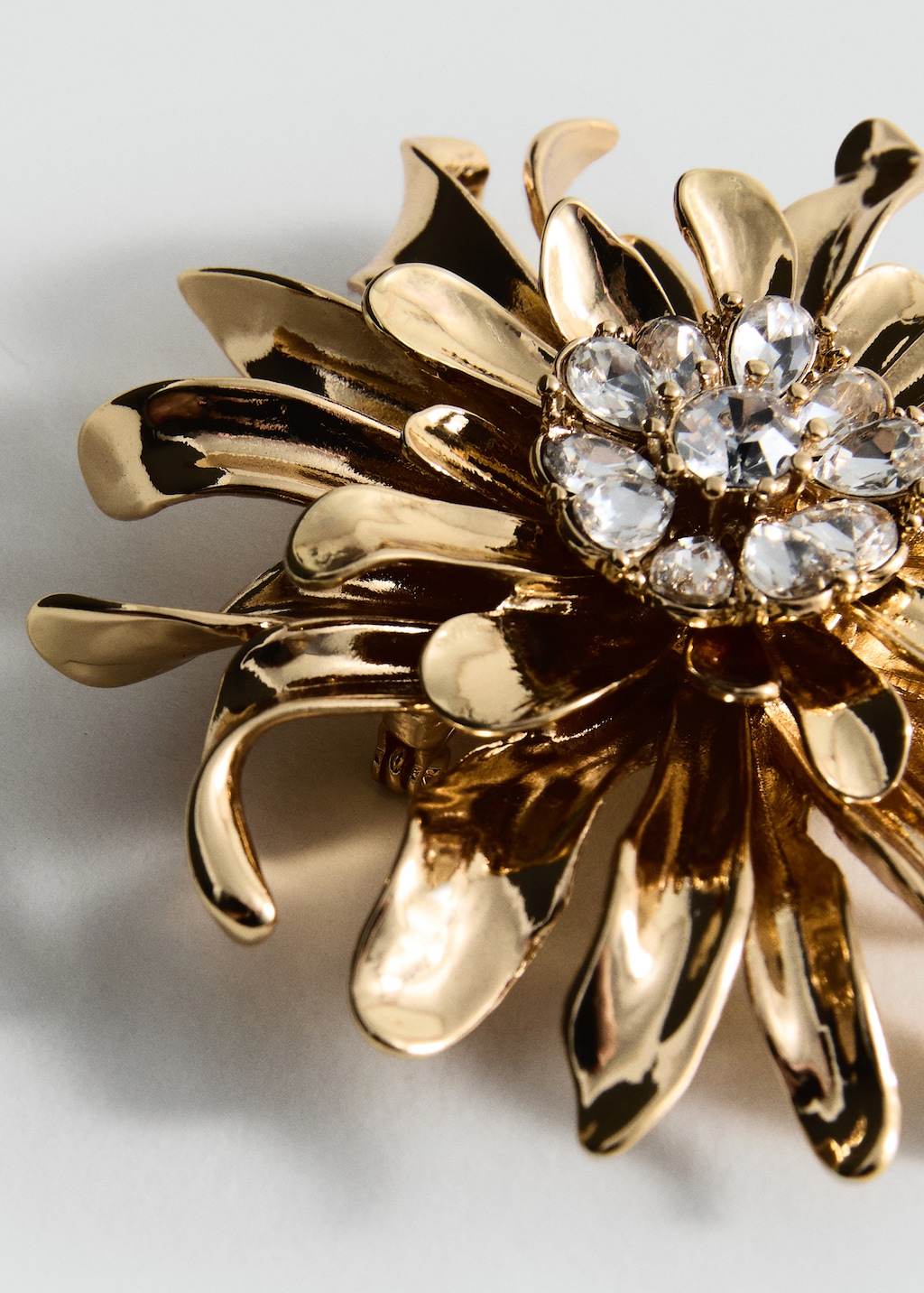 Metallic flower brooch