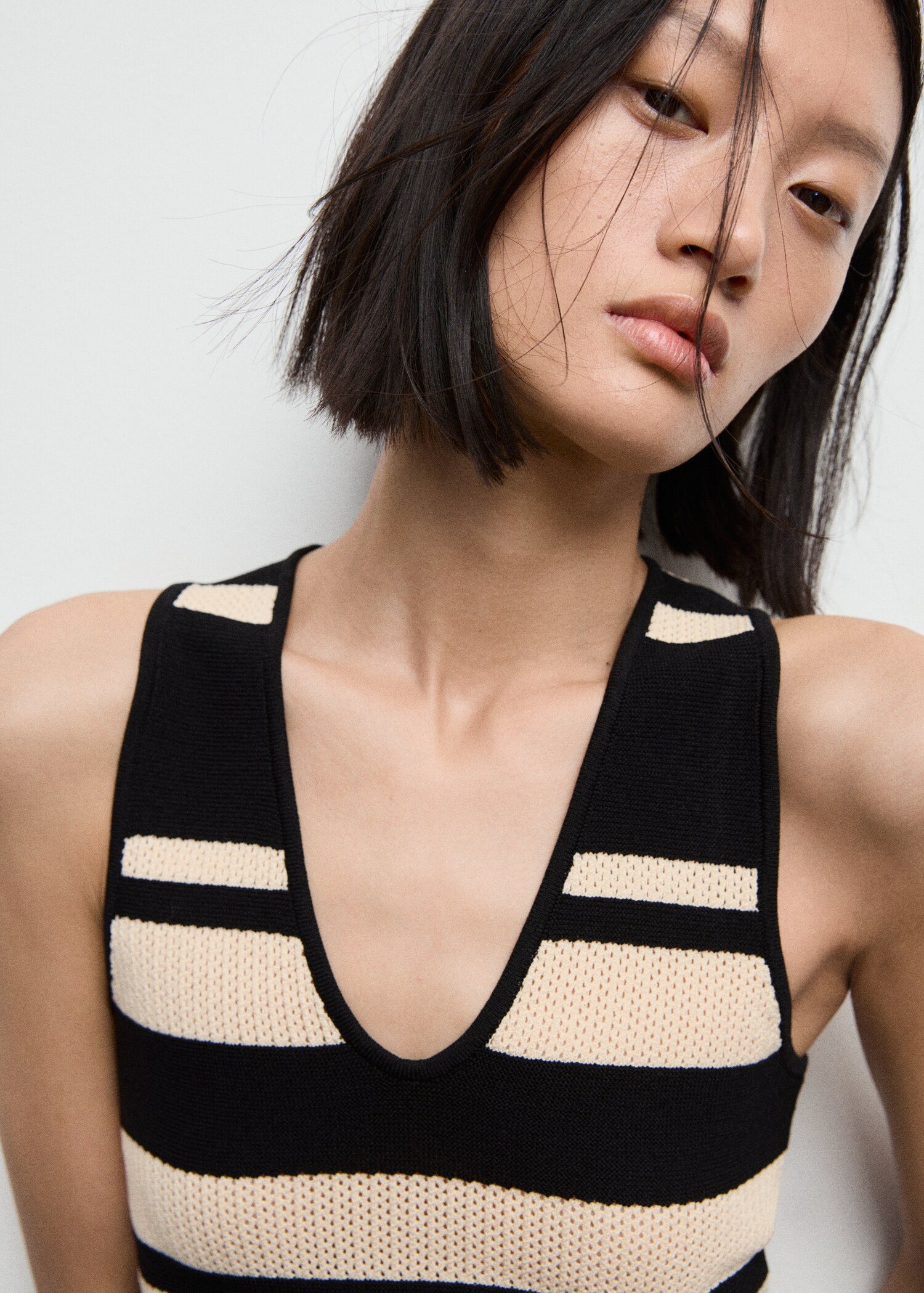Knitted V-neck top with stripes - Details of the article 1