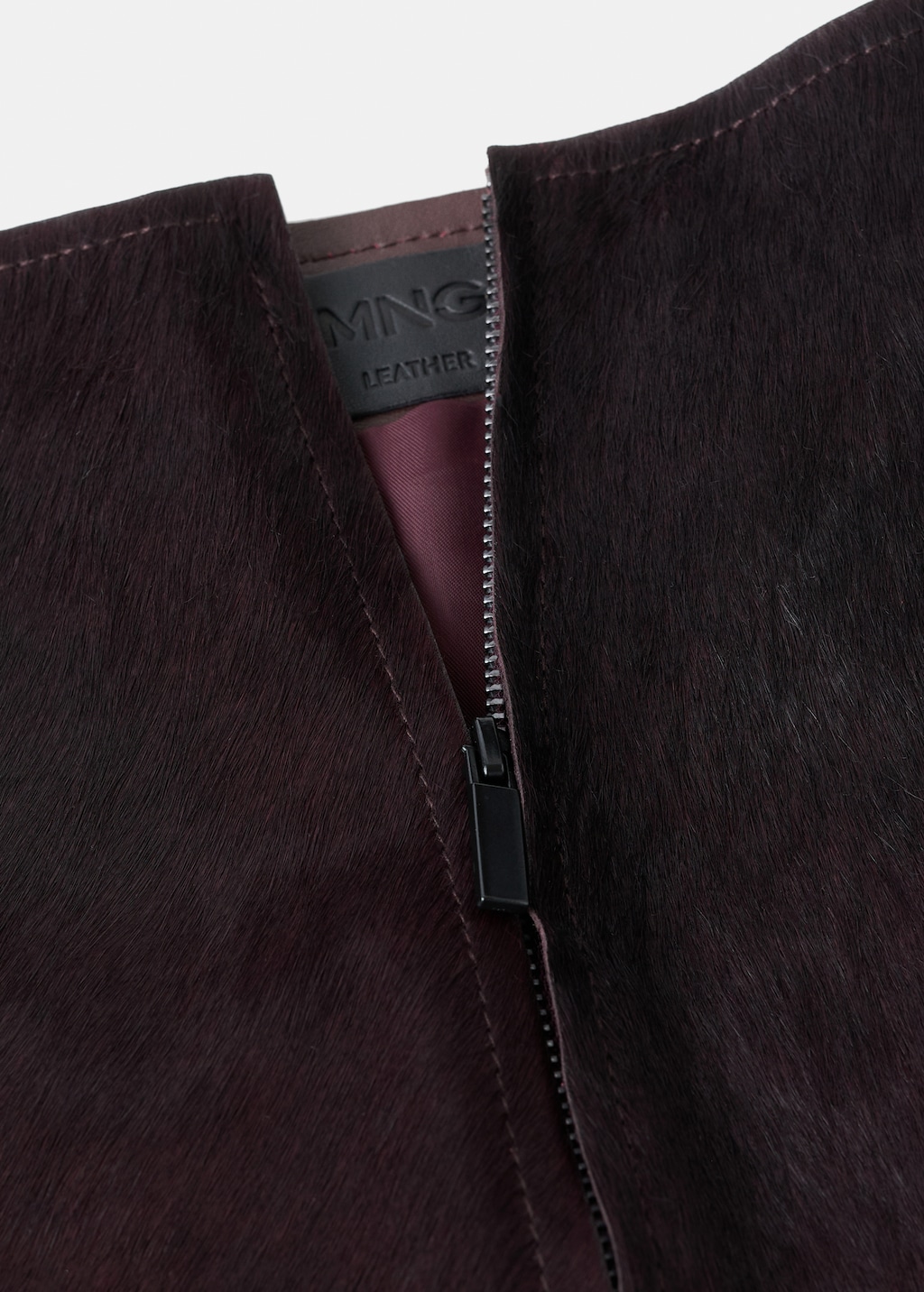 Leather mini-skirt with fur