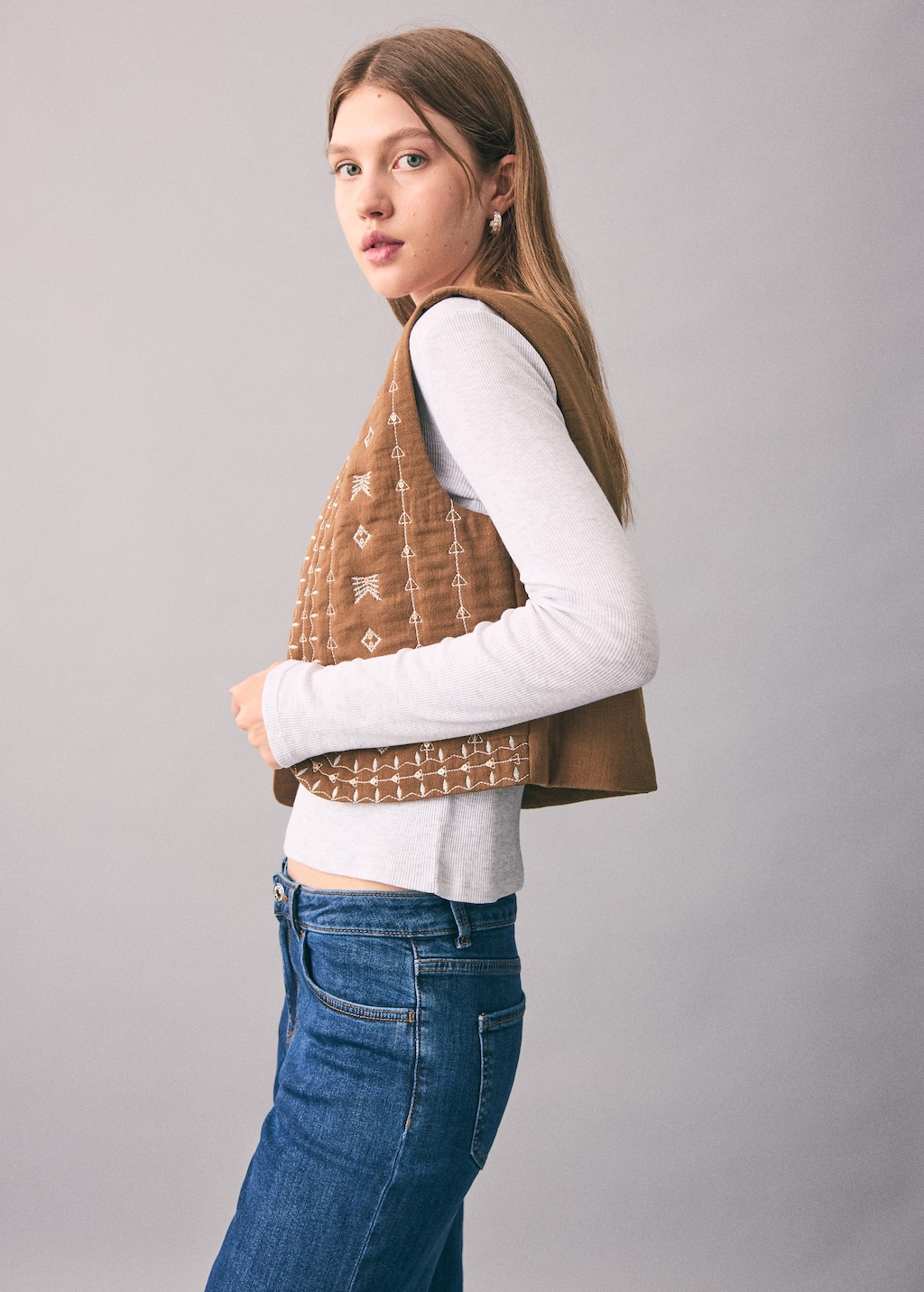 Embroidered quilted vest