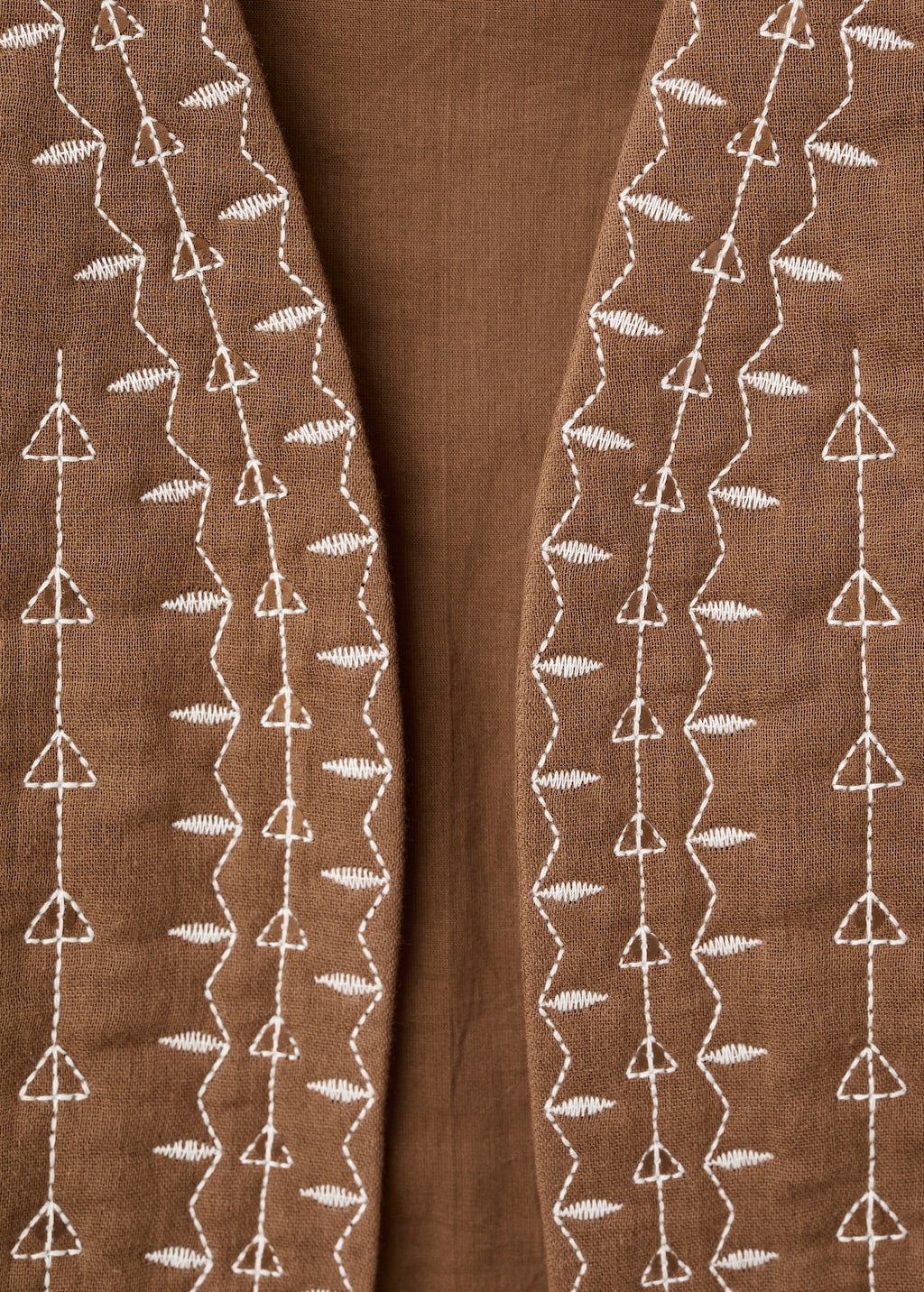 Embroidered quilted vest