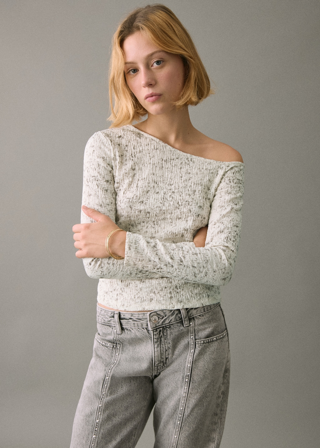 Speckled t-shirt with an asymmetrical neckline