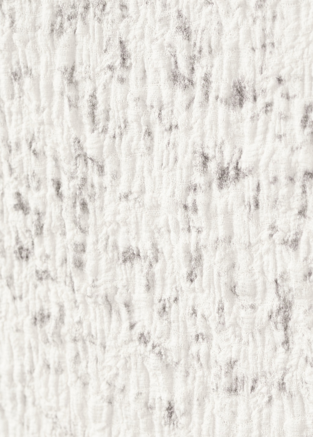 Speckled t-shirt with an asymmetrical neckline