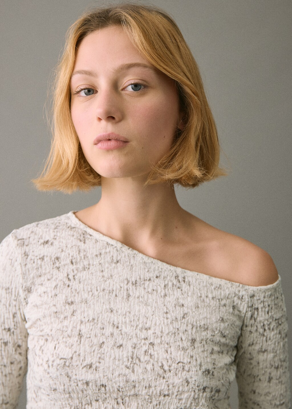 Speckled t-shirt with an asymmetrical neckline