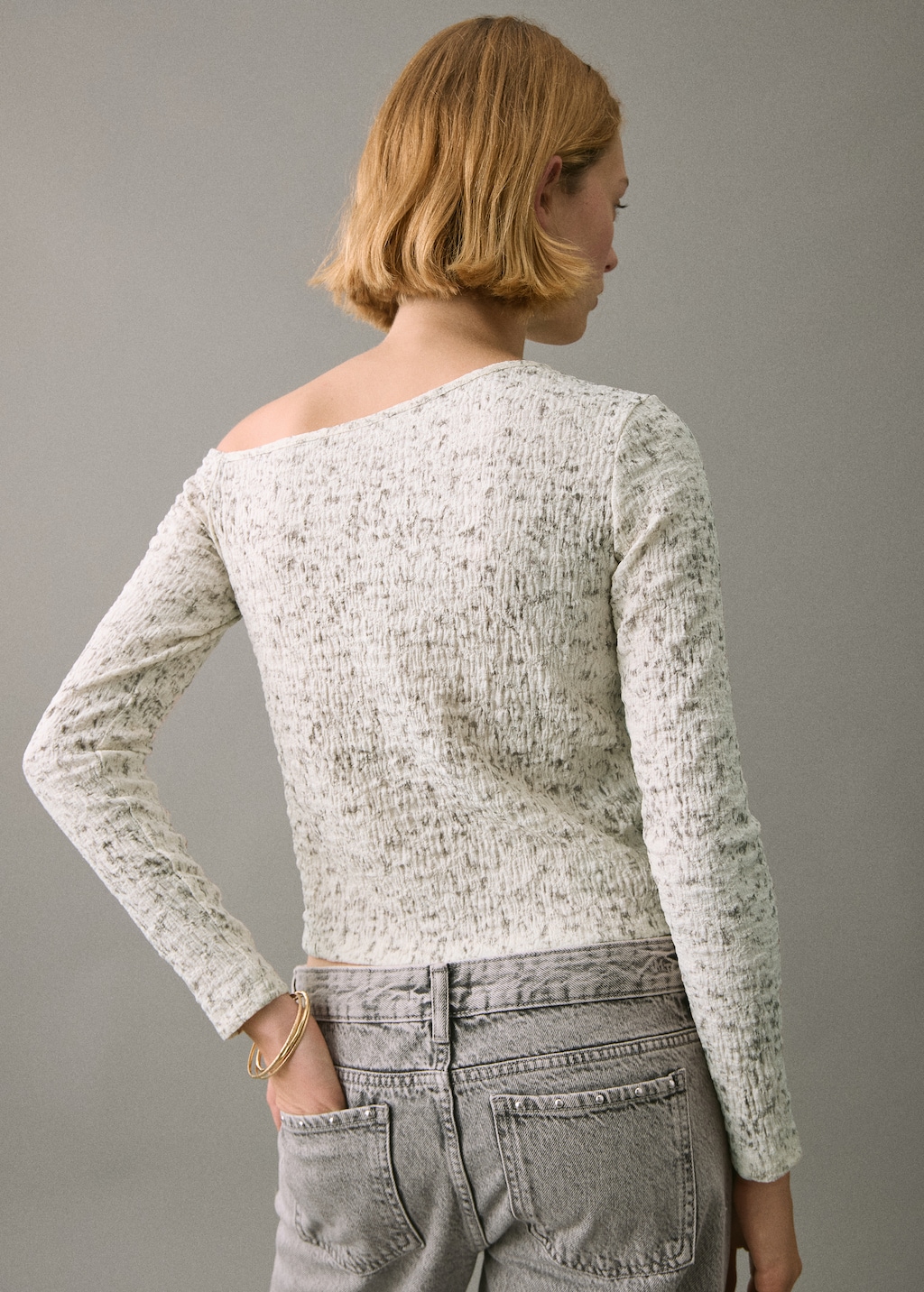 Speckled t-shirt with an asymmetrical neckline