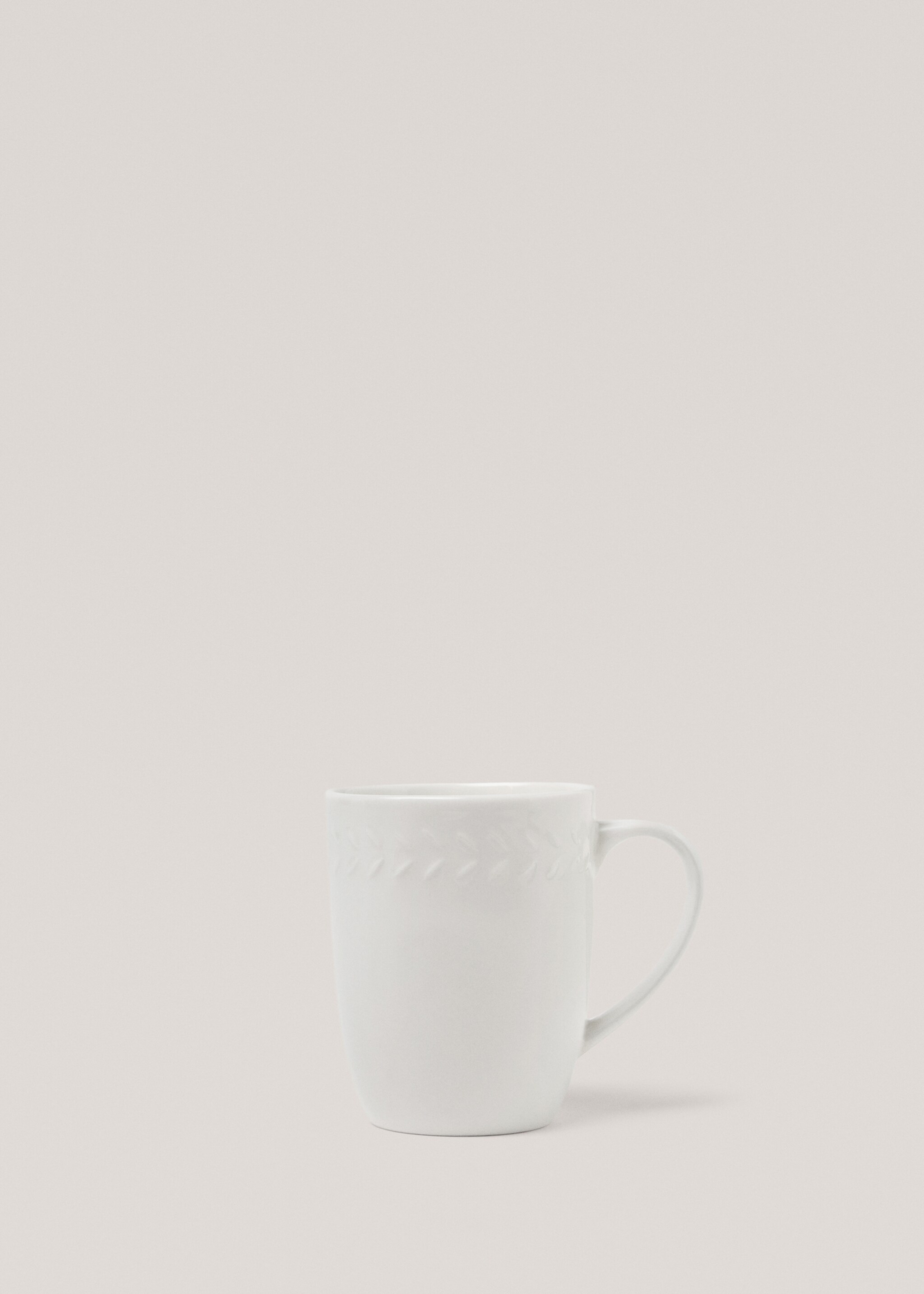 Stoneware embossed coffee cup - Article without model