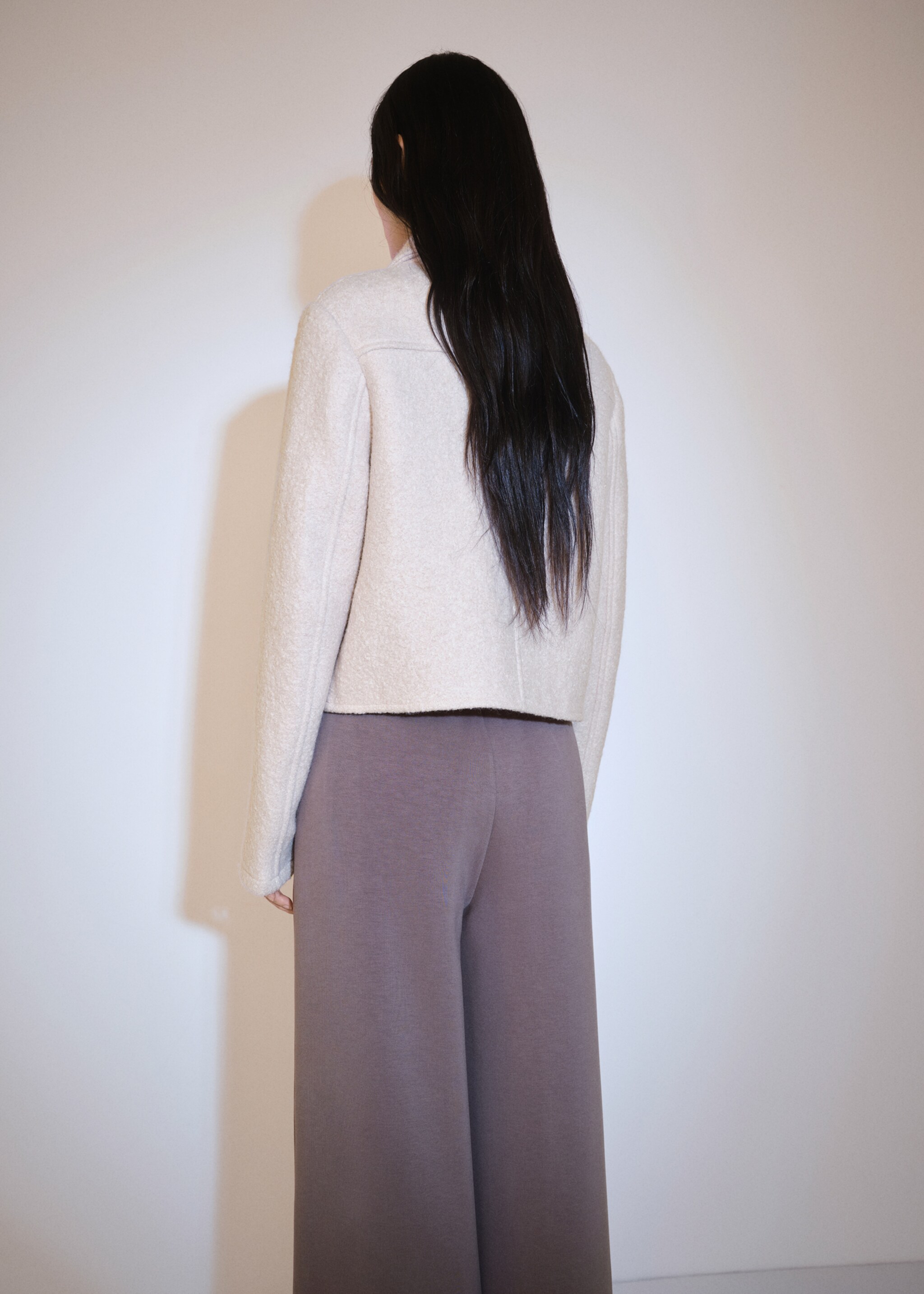Wool jacket with pockets - Reverse of the article