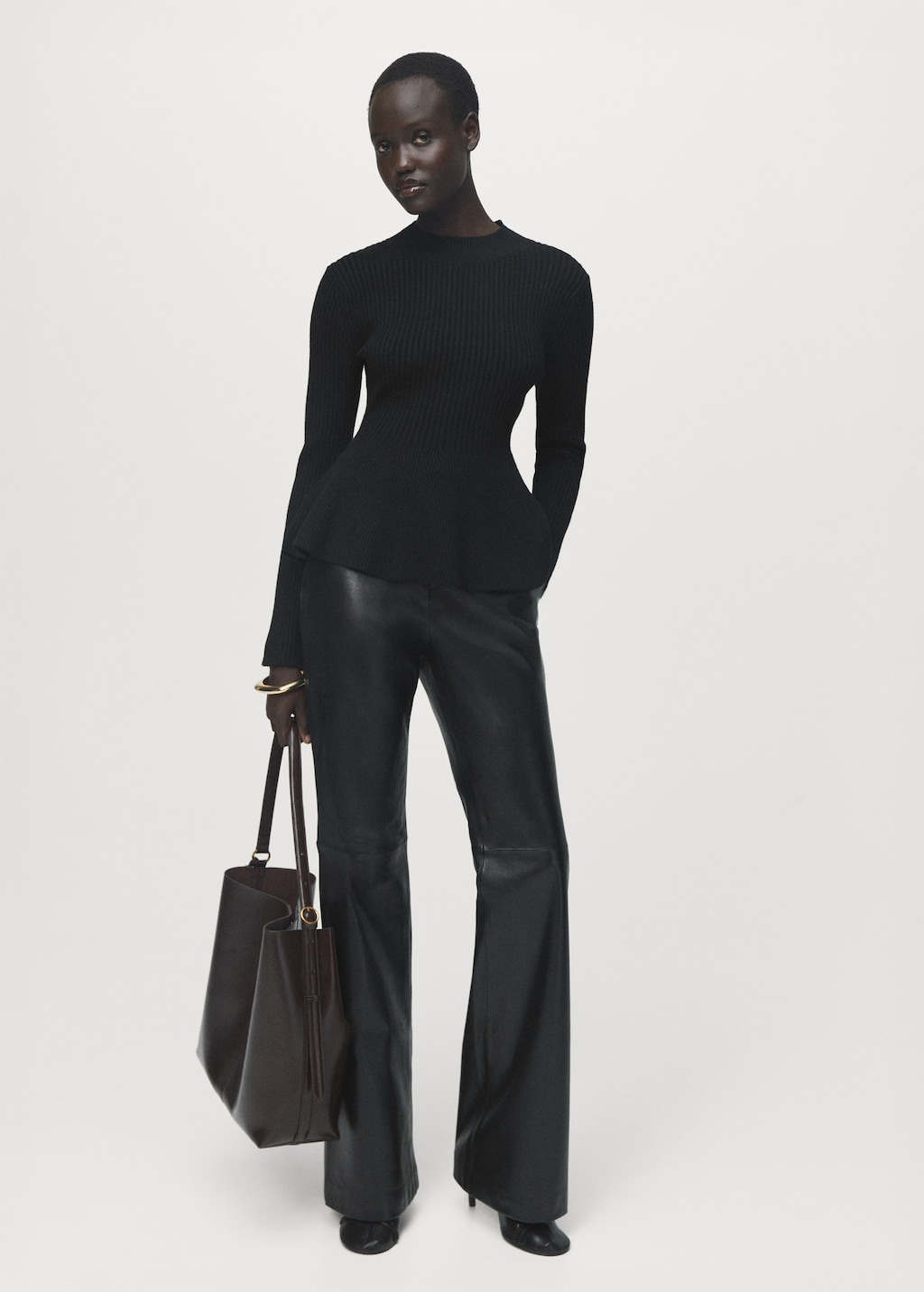 Ribbed peplum sweater