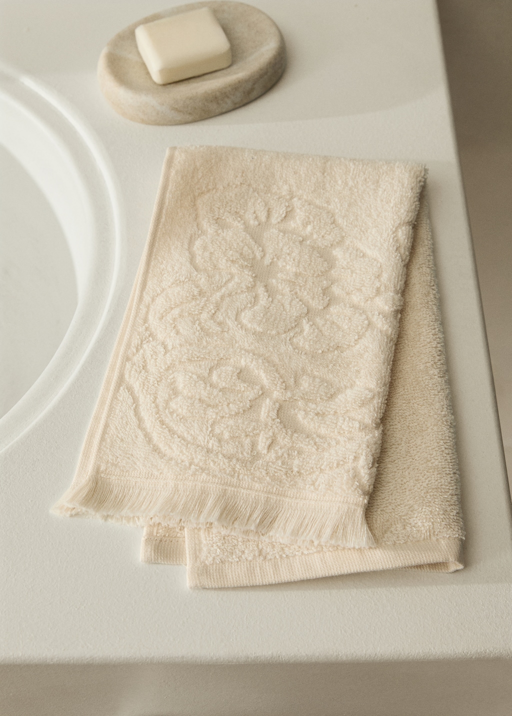 Hand towel with floral trim
