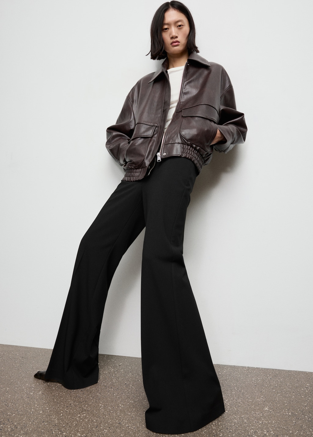 High-waisted flared trousers
