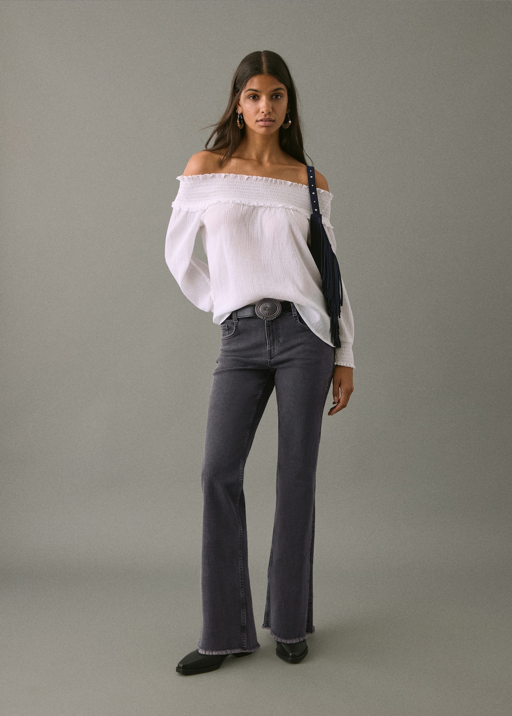 Frayed low-rise skinny jeans