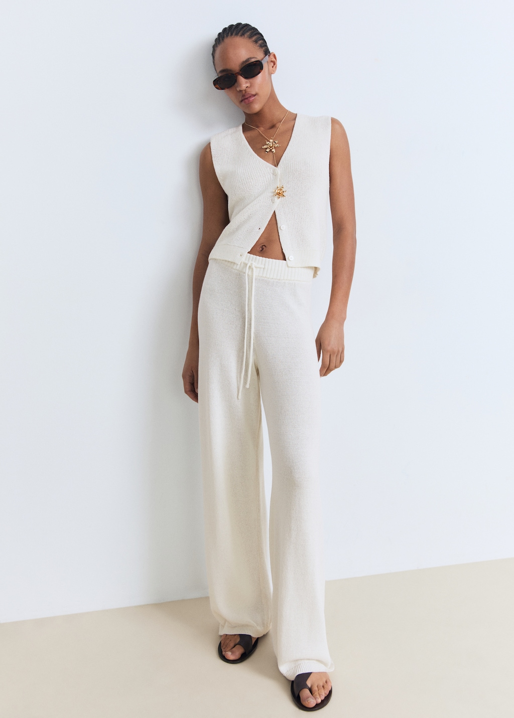 Openwork knitted trousers - image 2