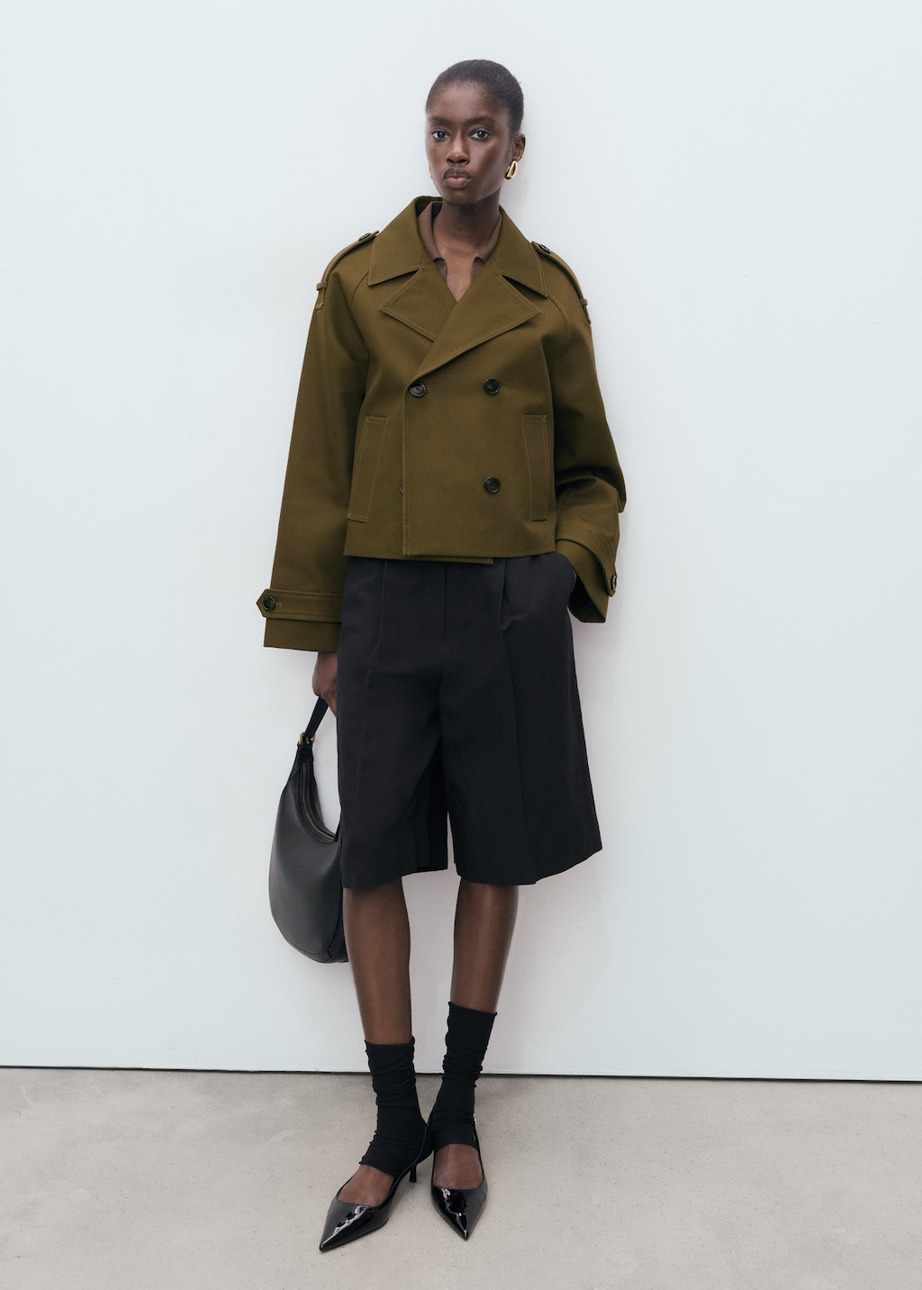 Oversized short double-breasted trench coat - Women | MANGO USA