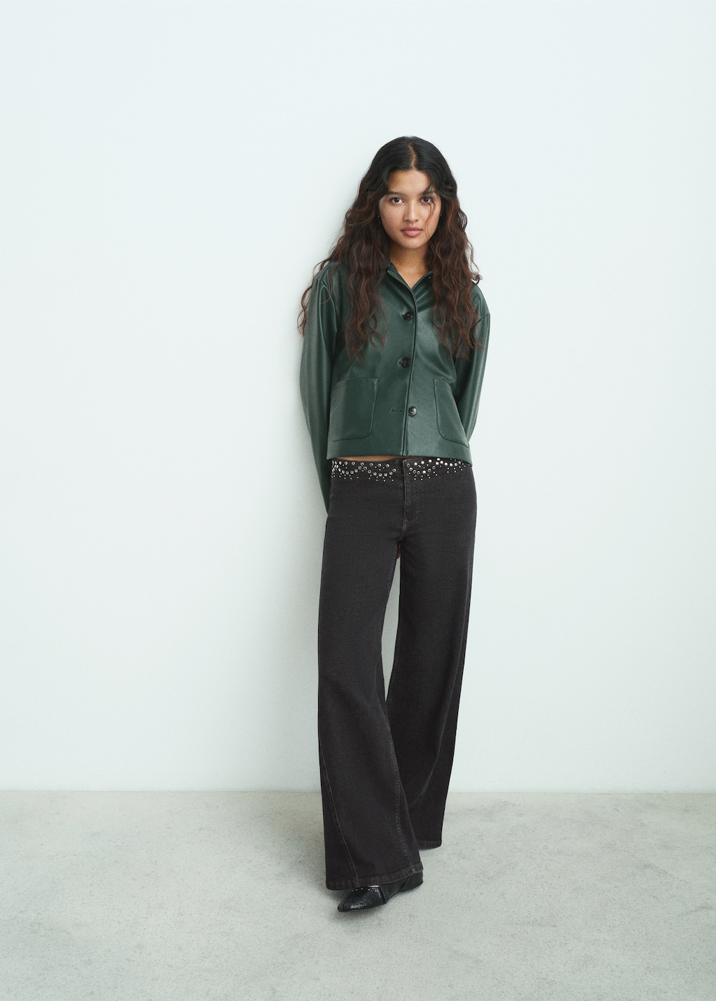 Low-waist studded jeans