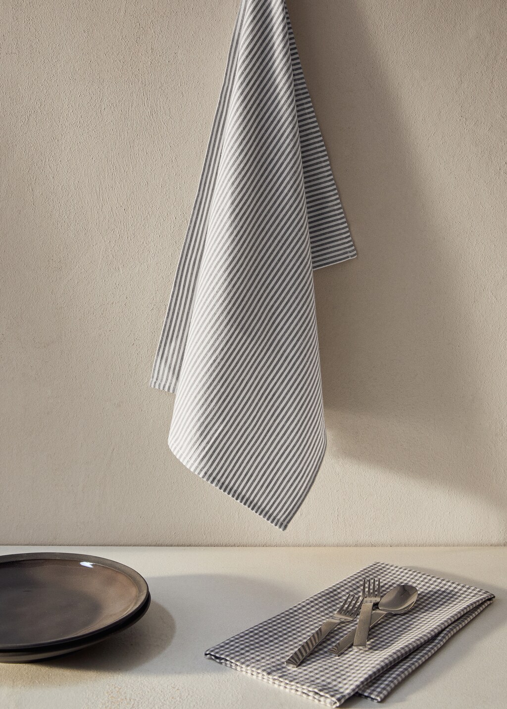 Checked and striped kitchen towel