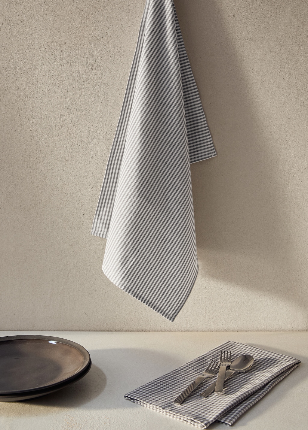 Checked and striped kitchen towel