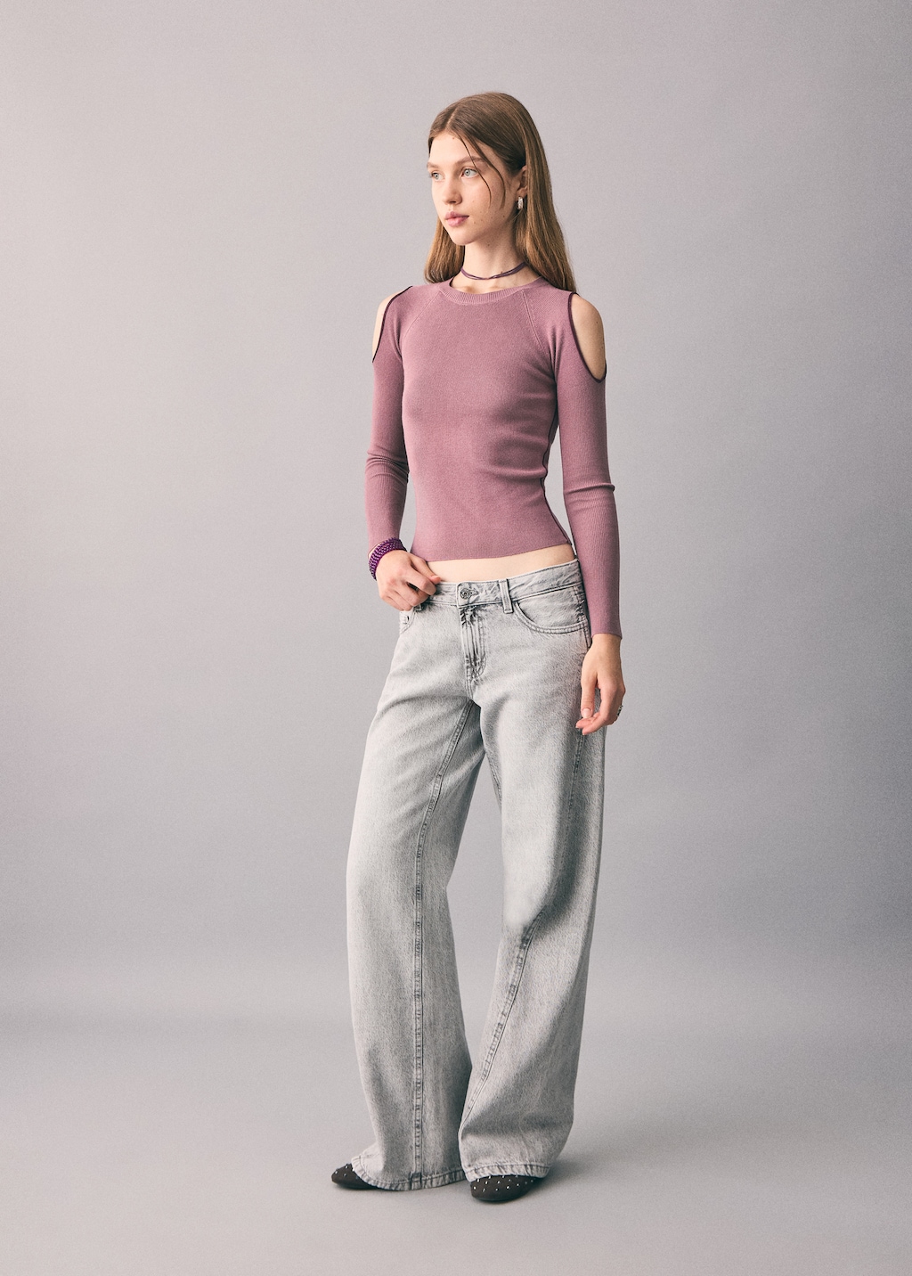 Knitted sweater with cut-out