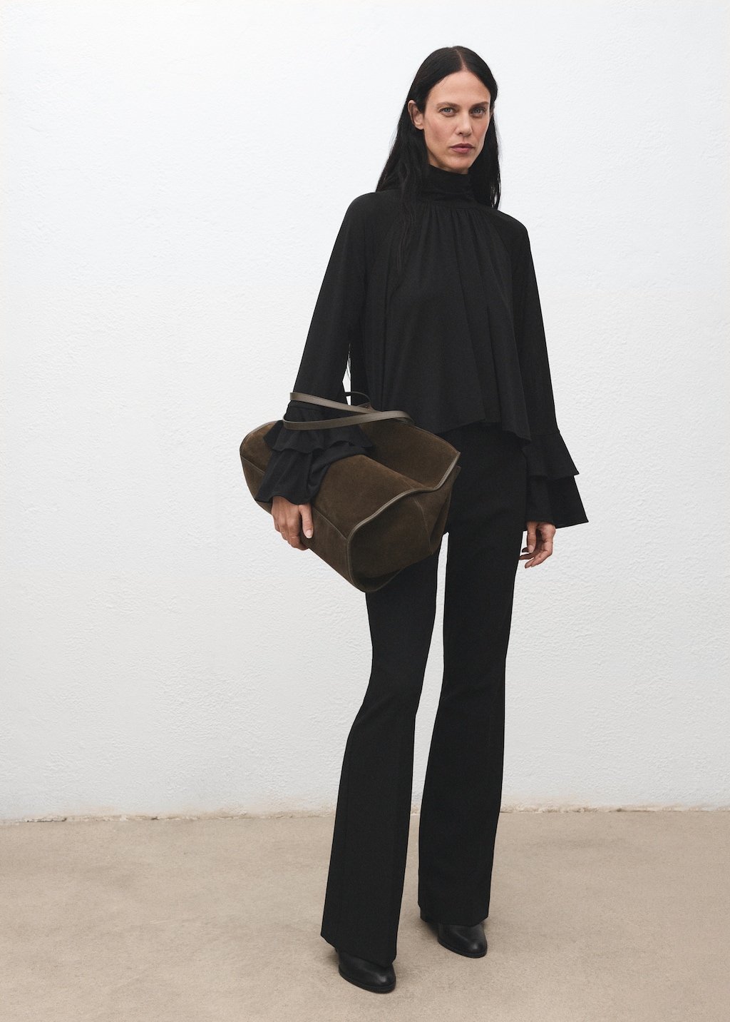 Blouse with flared sleeves and ruffles