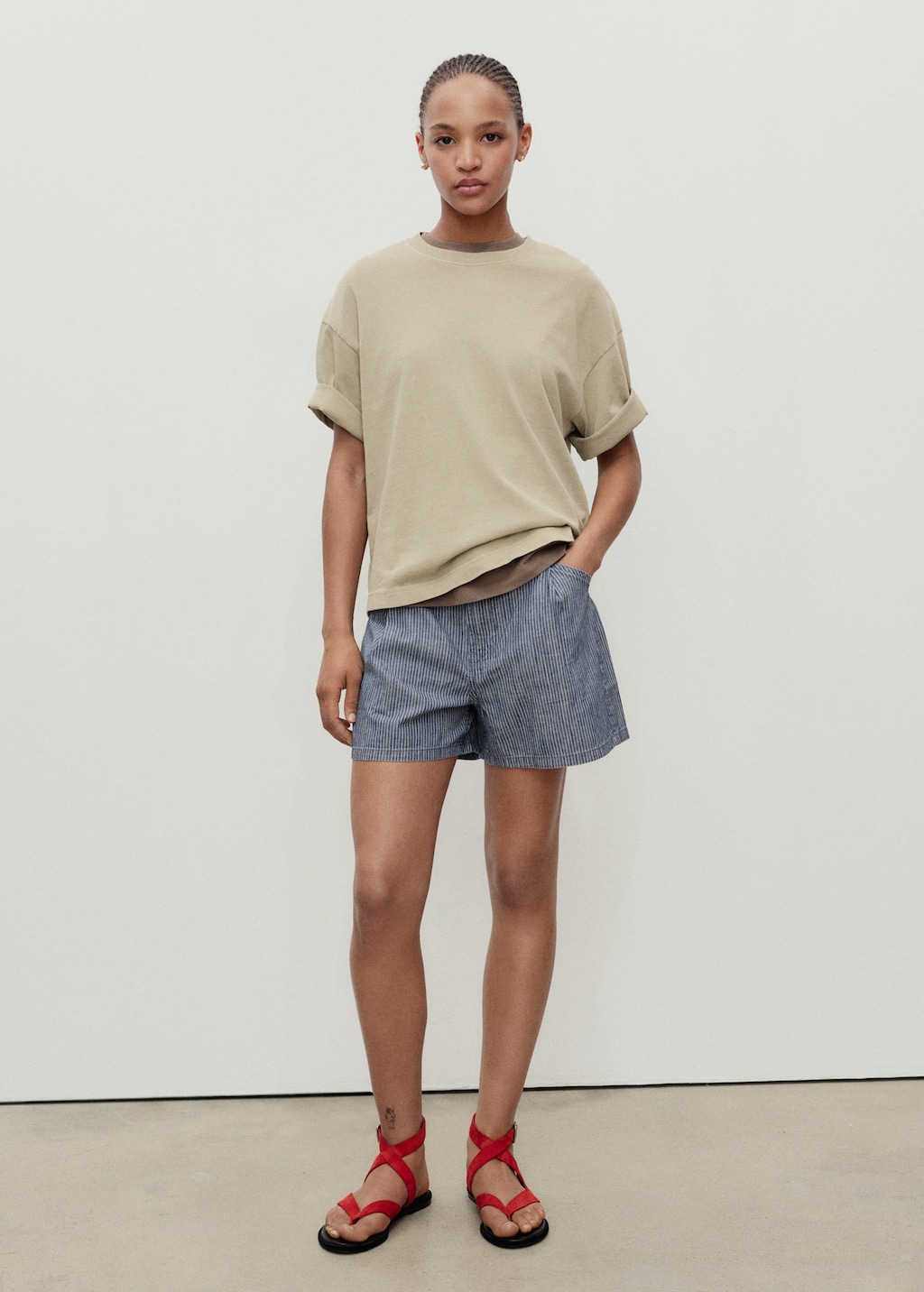 Striped denim shorts with pleats