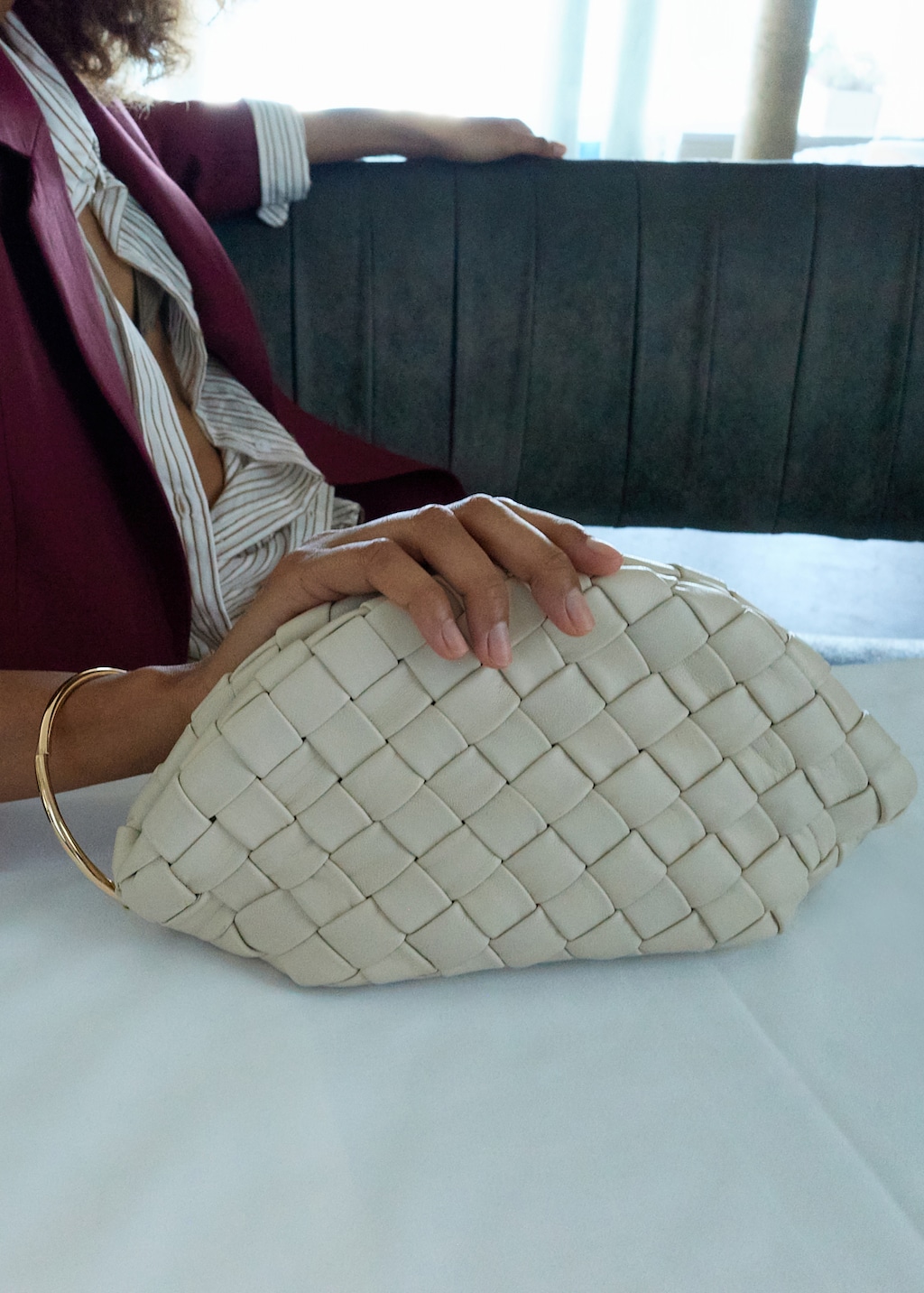 Braided leather clutch bag