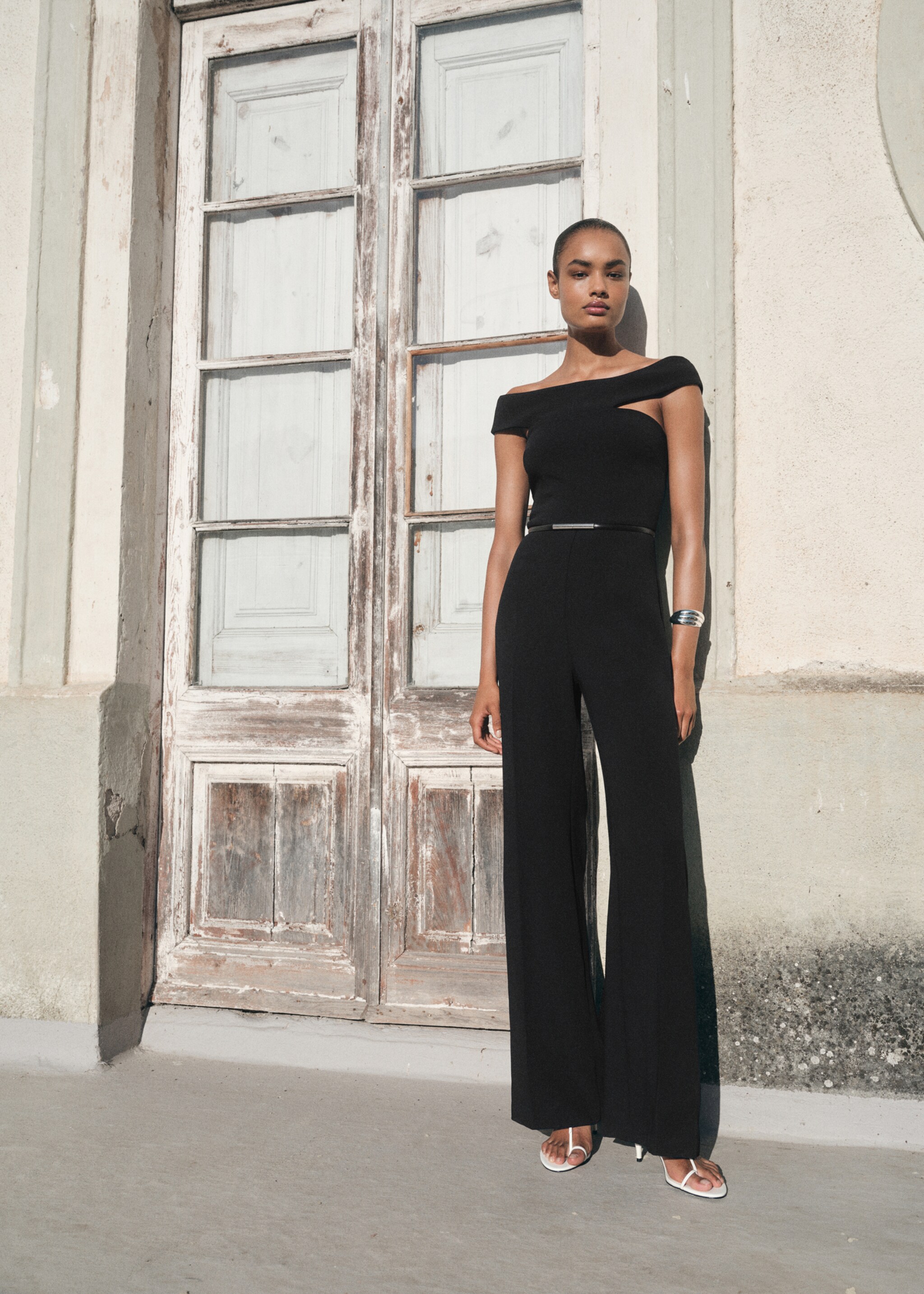 Asymmetric long jumpsuit - General plane, Black. Ref: 17064118-00.