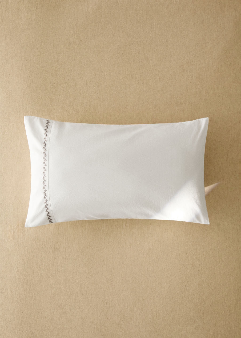 200-thread count percale cotton pillowcase in with embroidered detail for cot