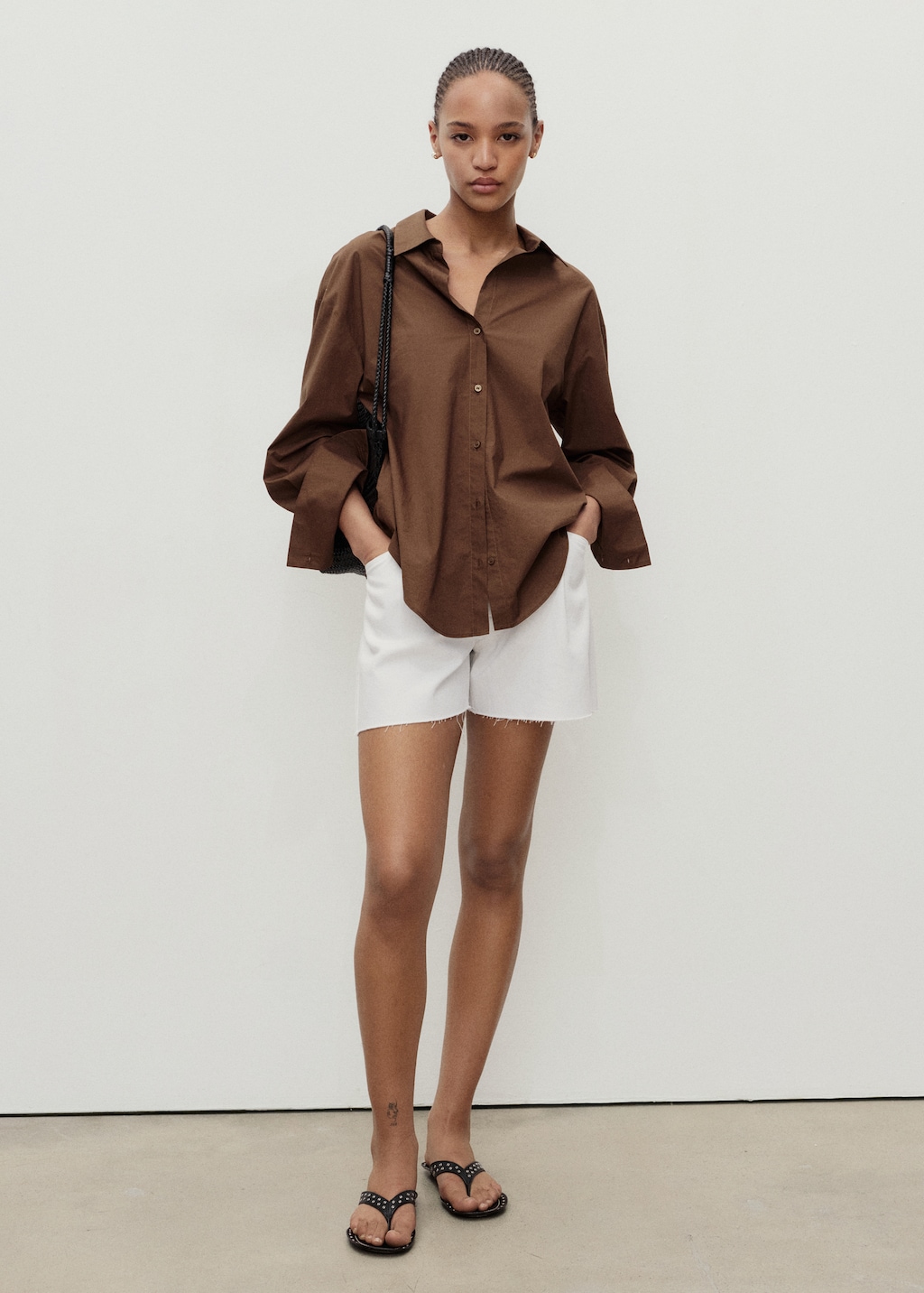Denim shorts with frayed hem and pleats - image 2