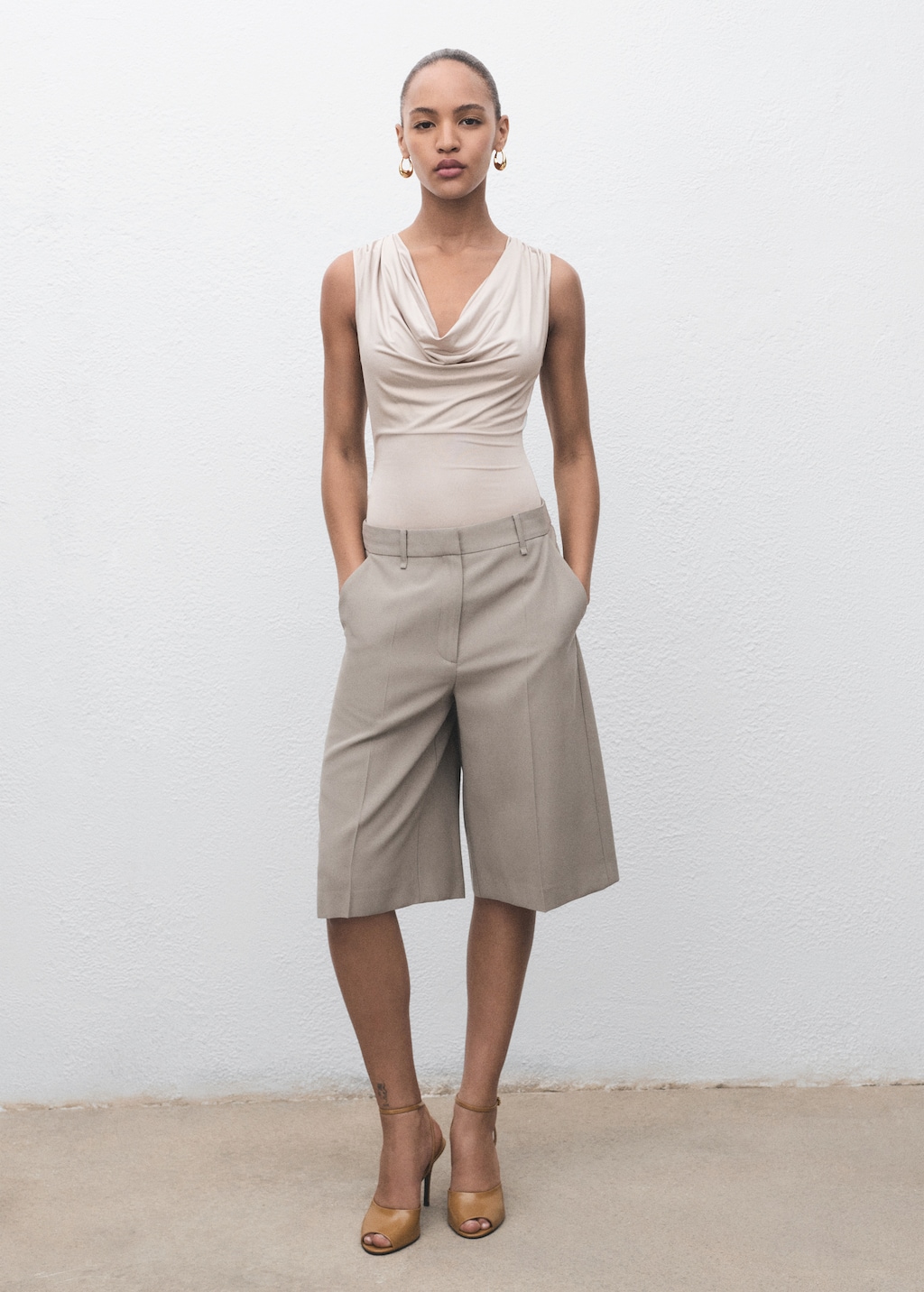 Bodysuit with draped neckline