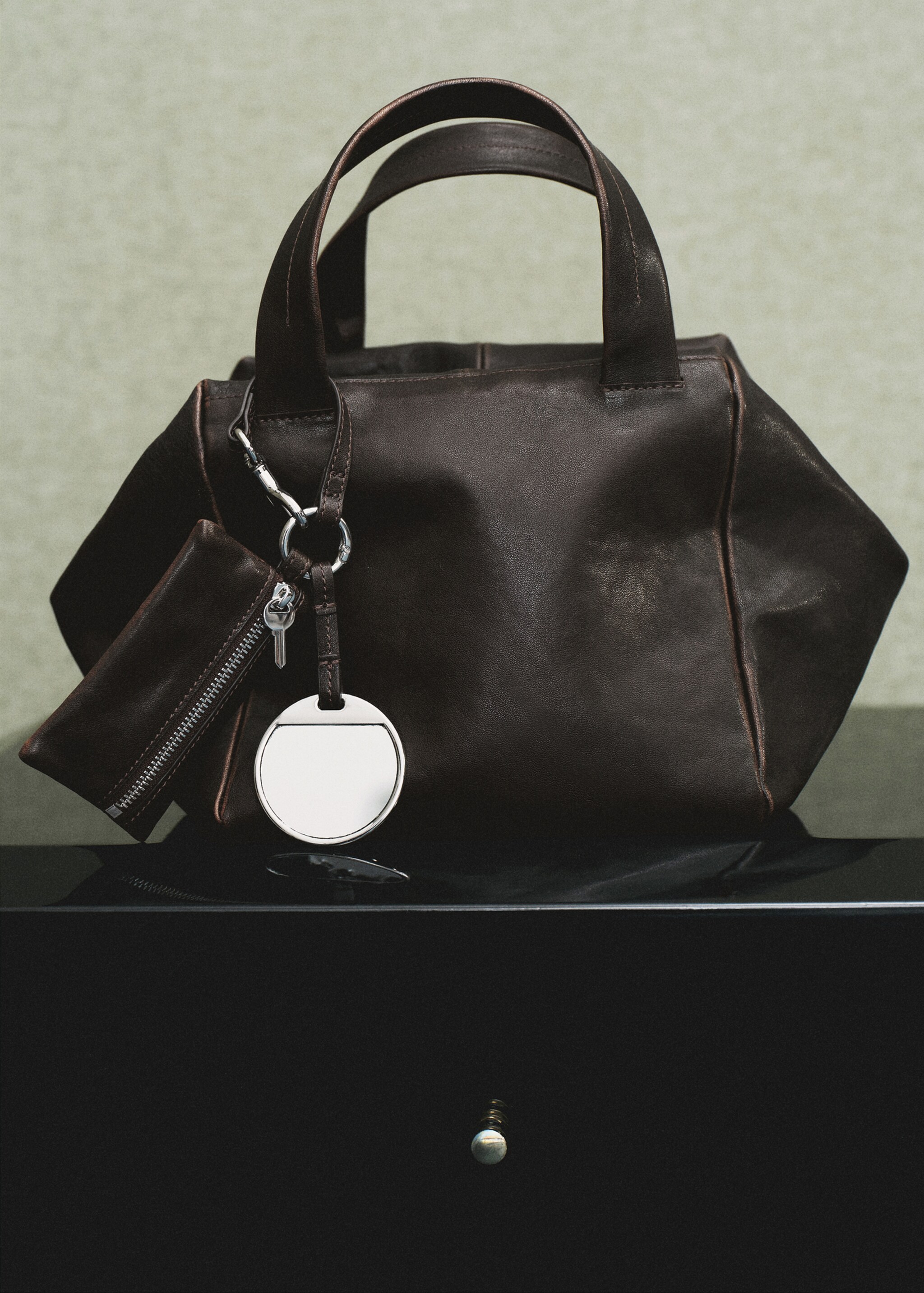 Leather clutch bag with charms - General plane, Chocolate. Ref: 17075170-00.