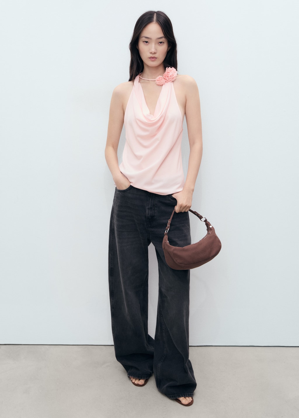 Draped blouse with flower detail