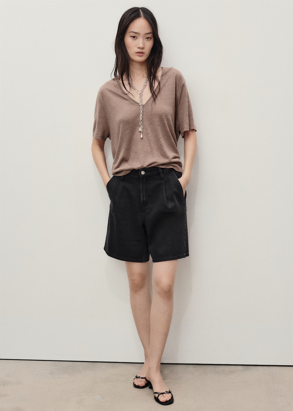 Mid-rise denim bermuda shorts with pleats