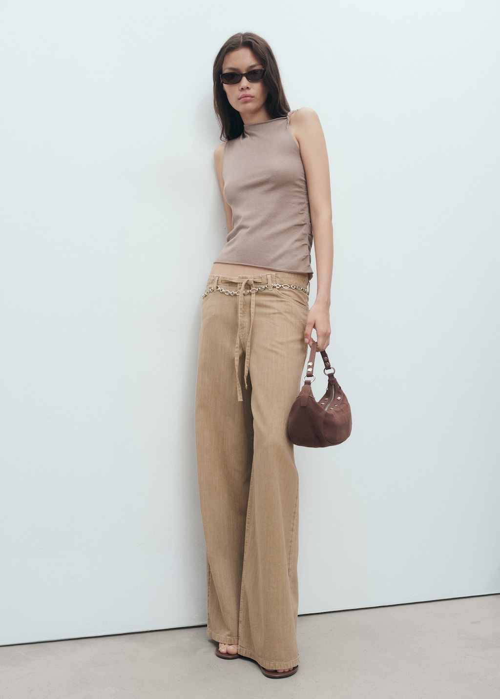 Asymmetrical knitted top with straps