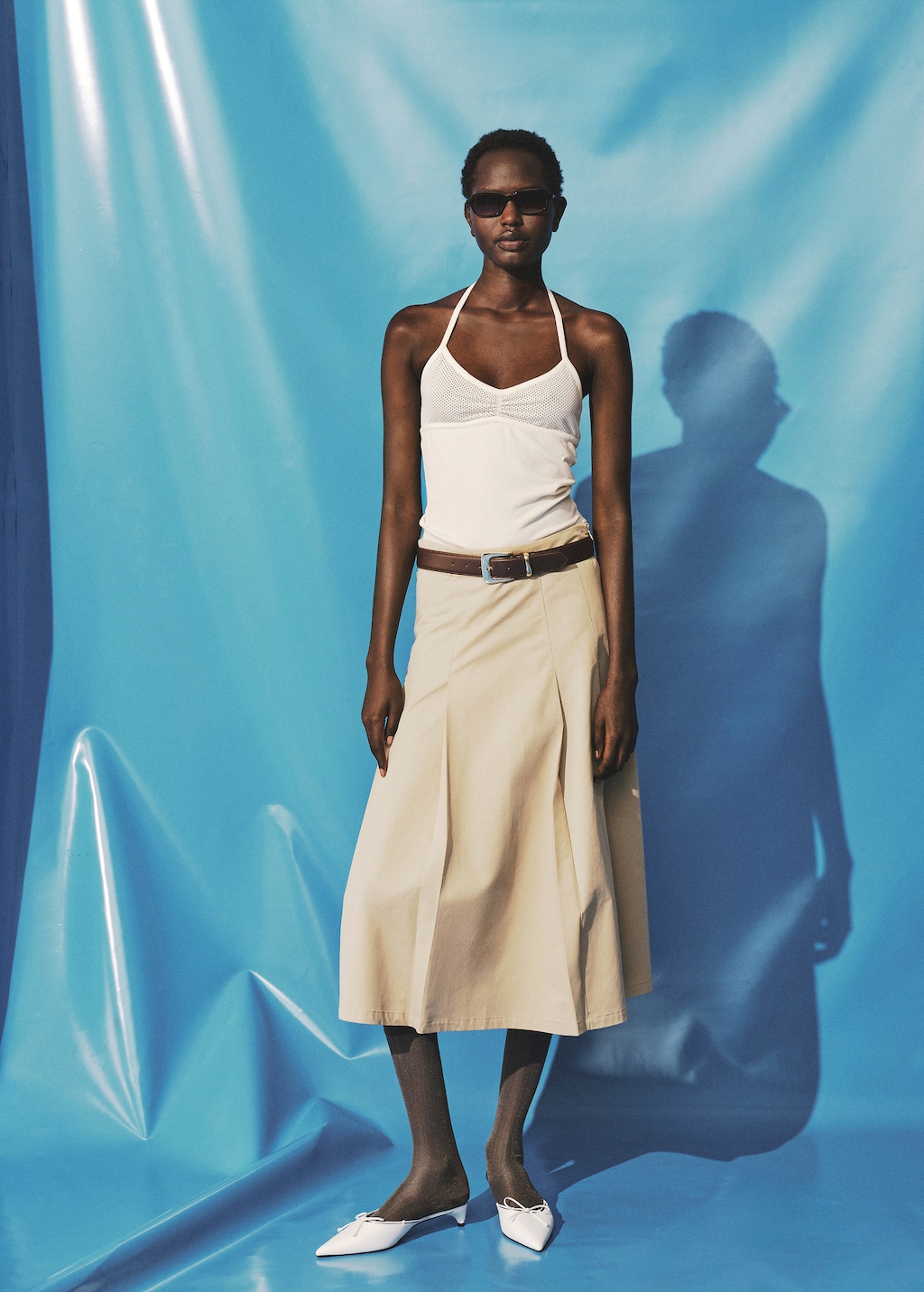 Top with perforated neckline