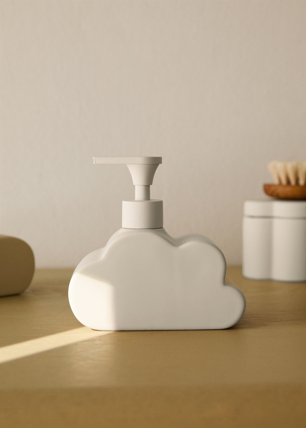 Cloud-shaped stoneware soap dispenser