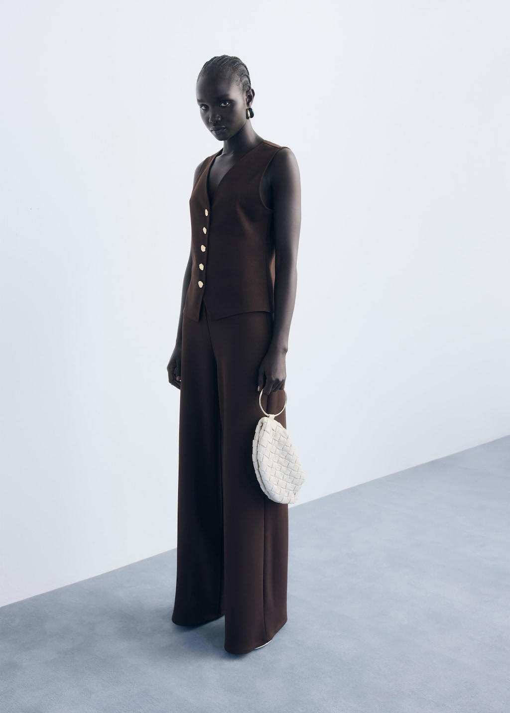 Vest with jewel buttons