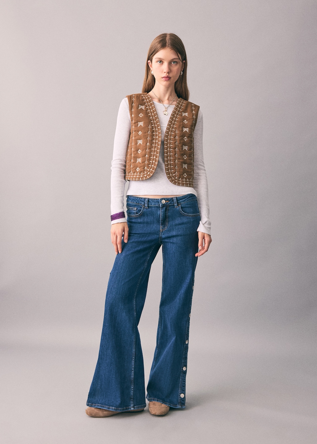 Embroidered quilted vest