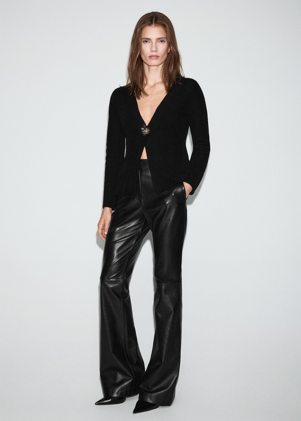 Knitted cardigan with jewel button